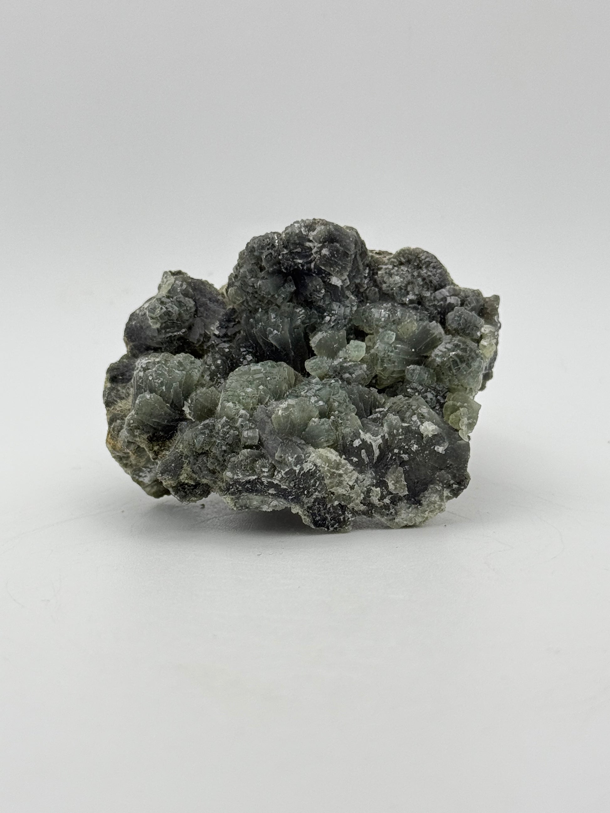 Raw prehnite specimen with amazing green color.