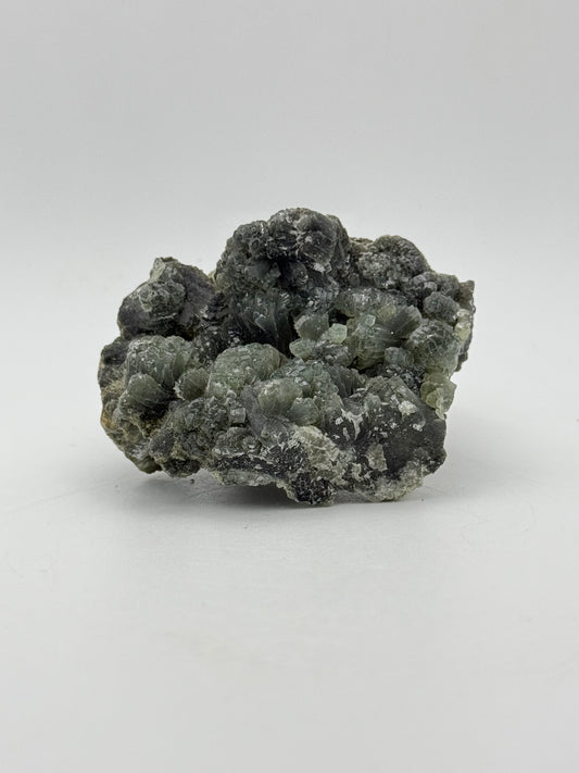 Raw prehnite specimen with amazing green color.