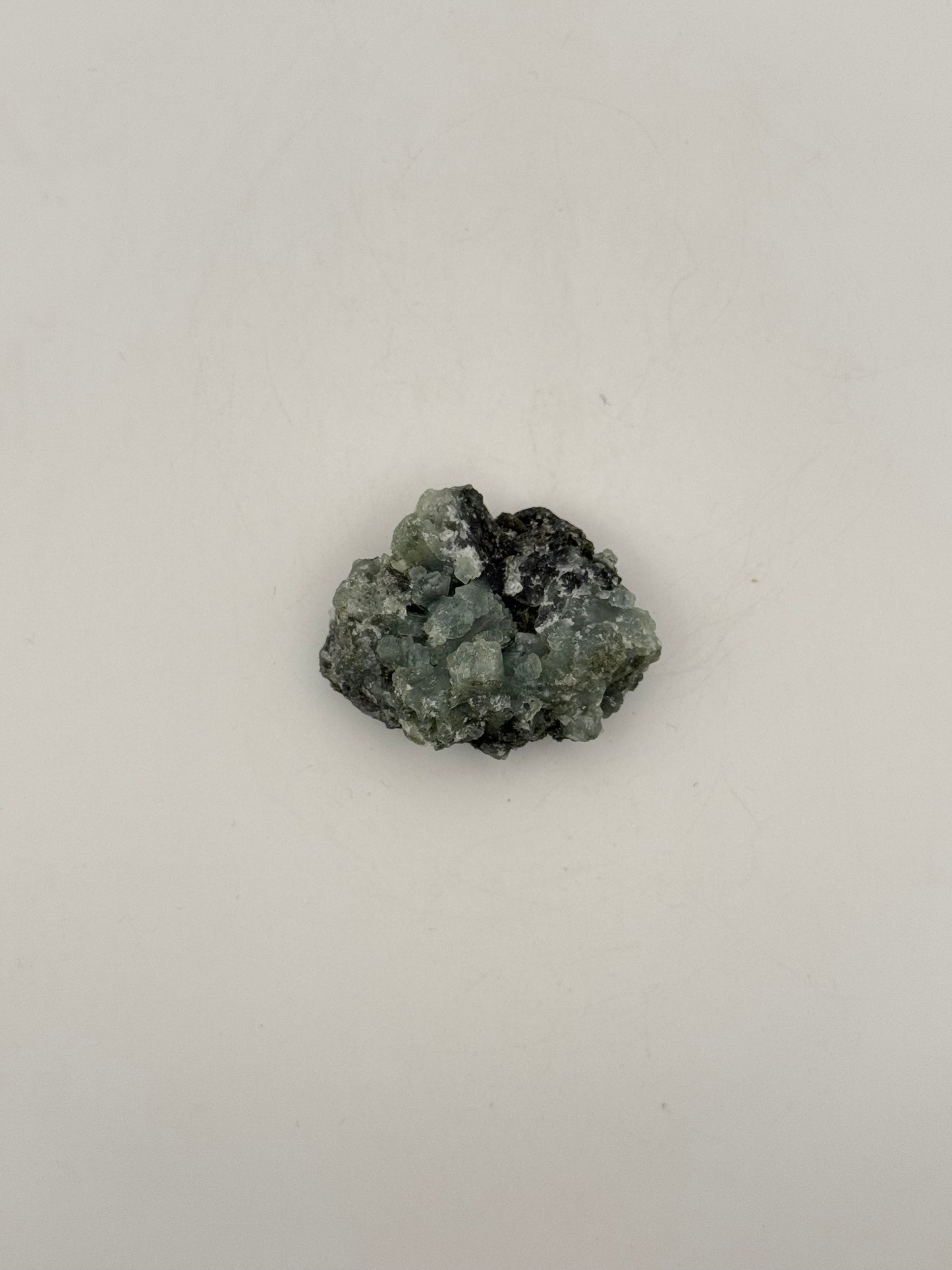 Raw prehnite specimen with amazing green color.