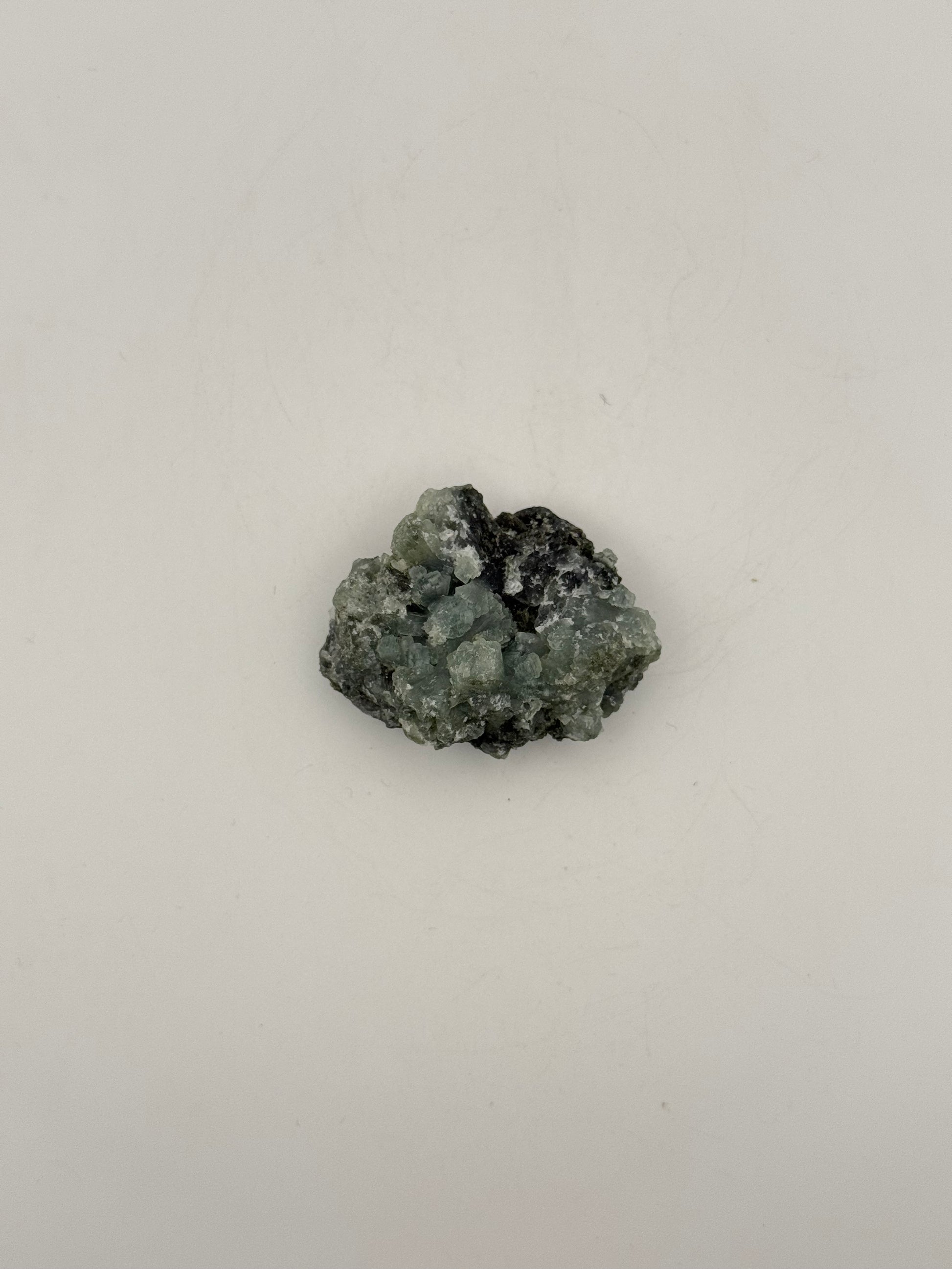 Raw prehnite specimen with amazing green color.