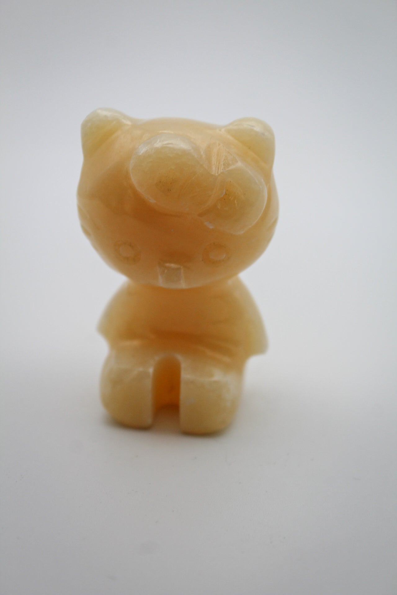 Orange Calcite Hello Kitty Carving