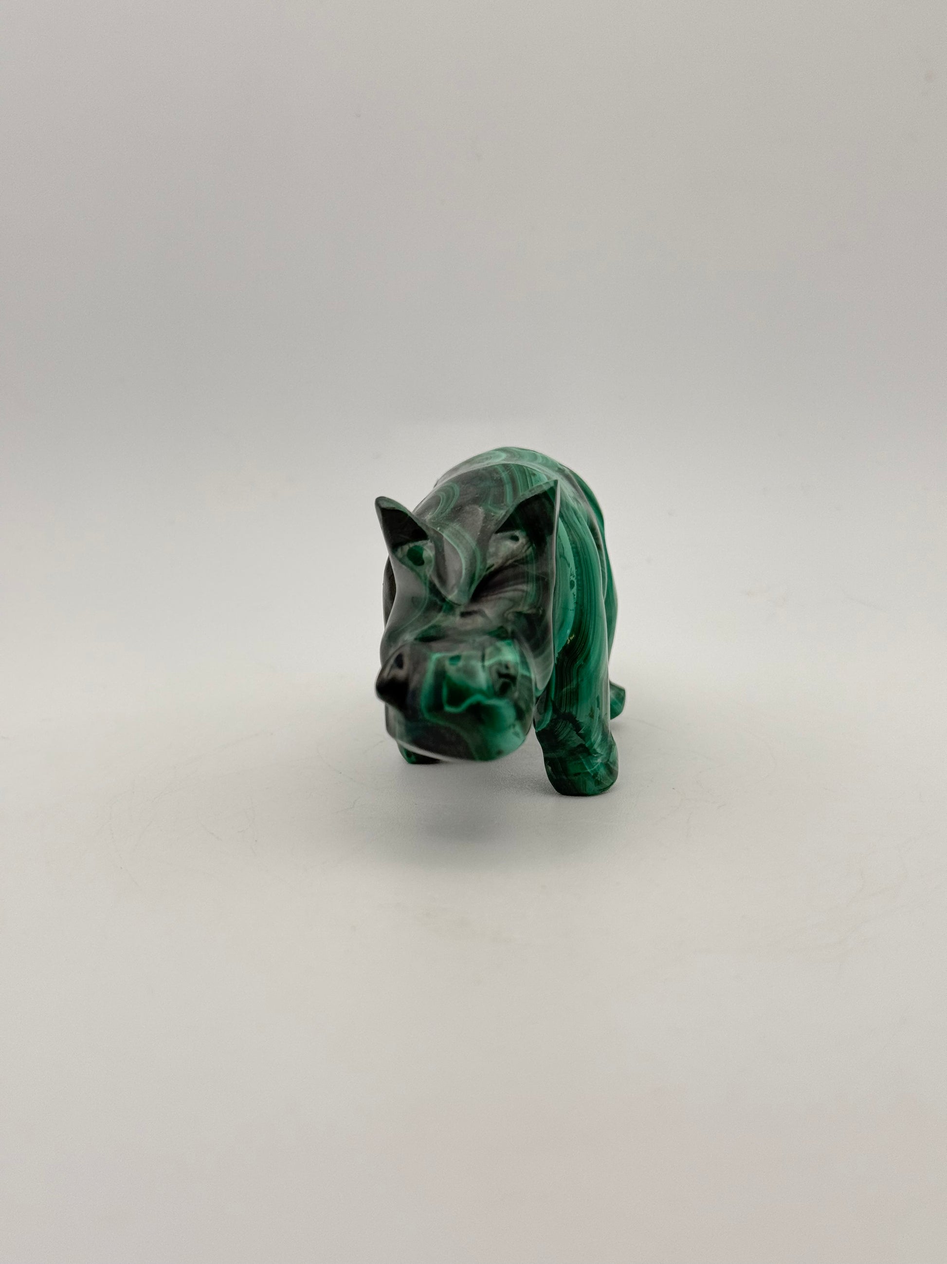 Malachite rhino carving.