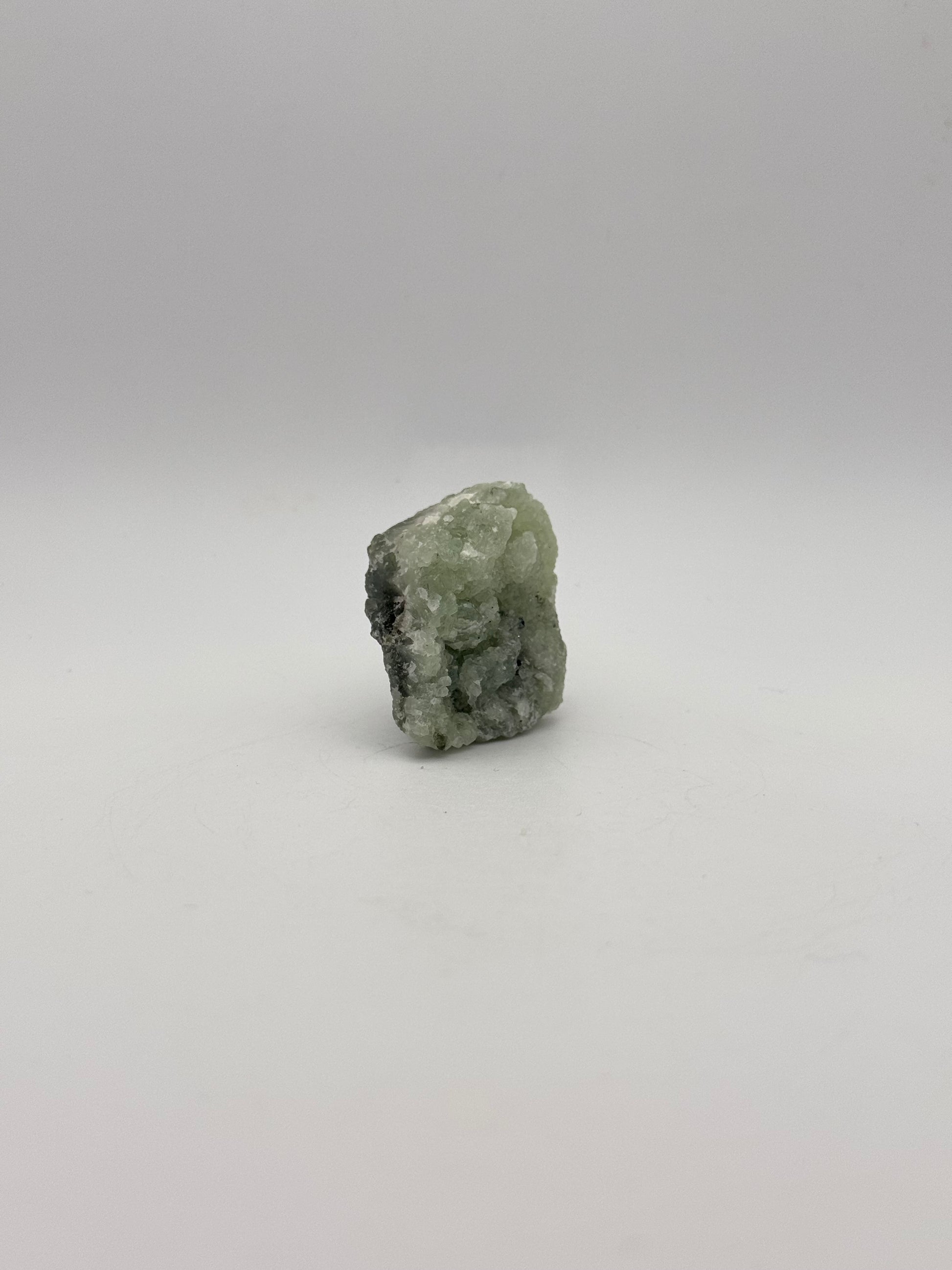 Raw prehnite specimen with amazing green color.