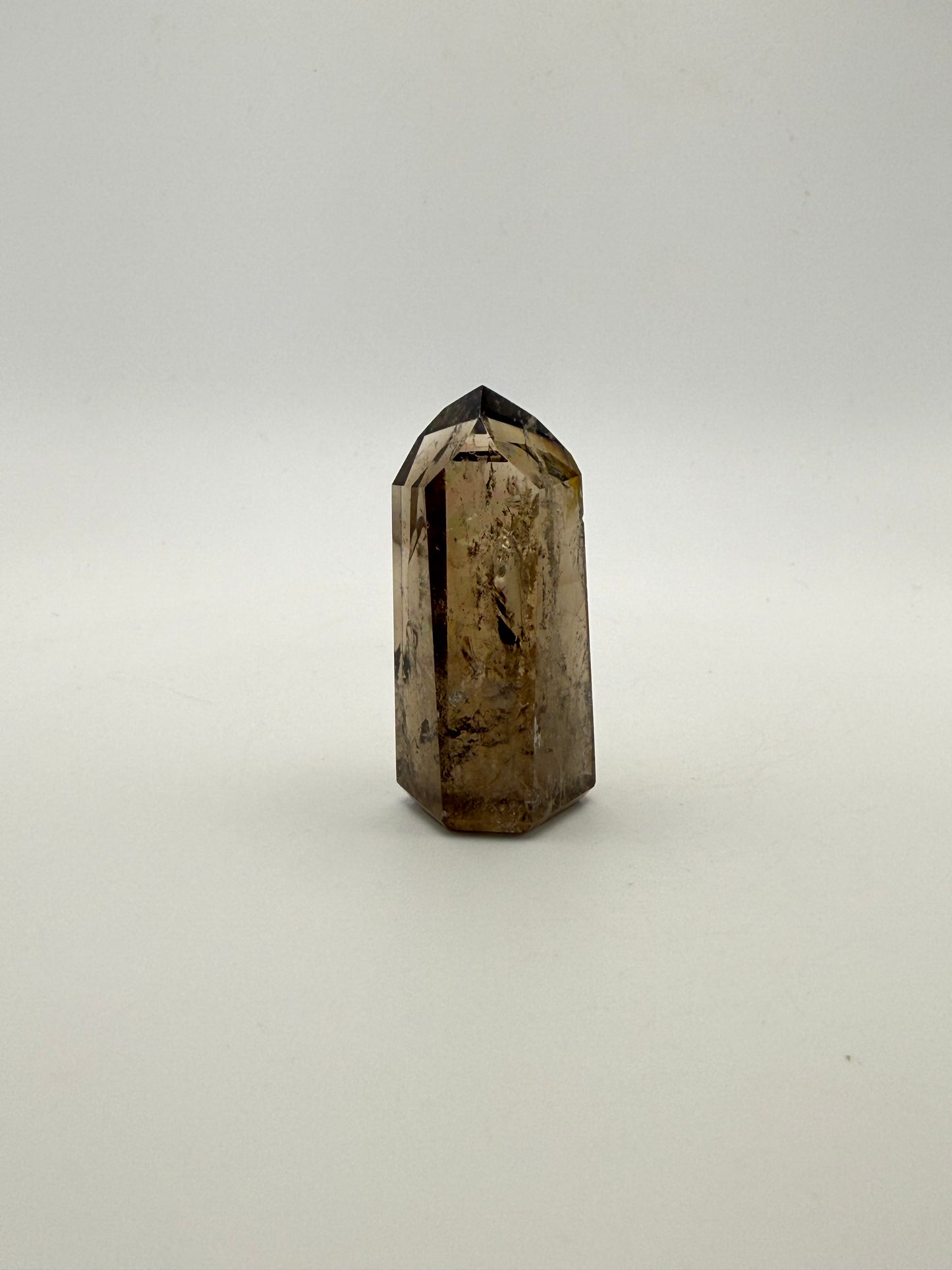 Polished natural citrine point.