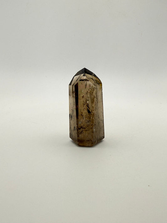 Polished natural citrine point.