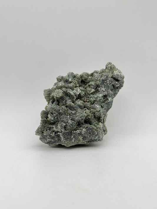 Raw prehnite specimen with amazing green color.