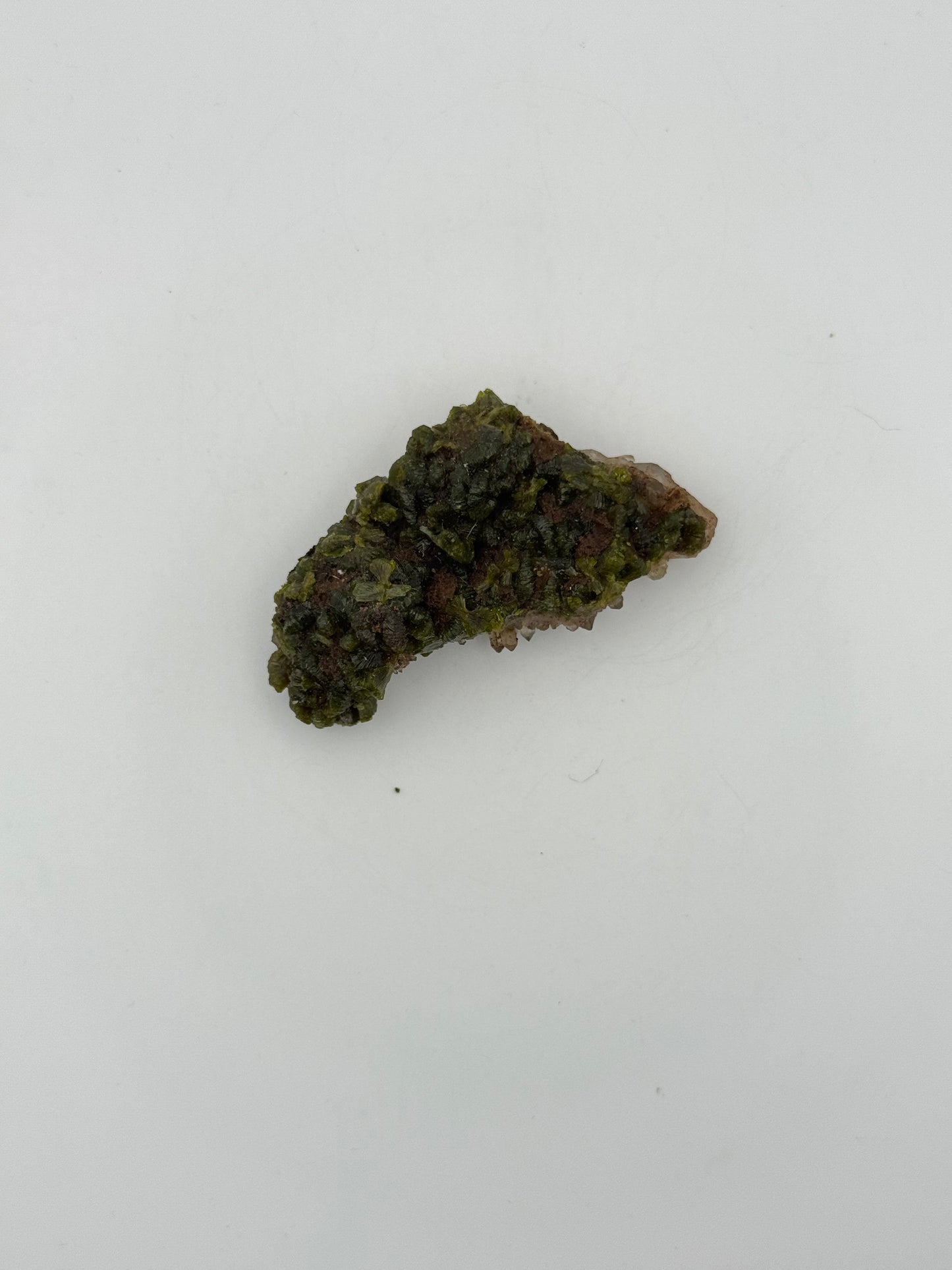 Epidote crystal cluster with good green color.