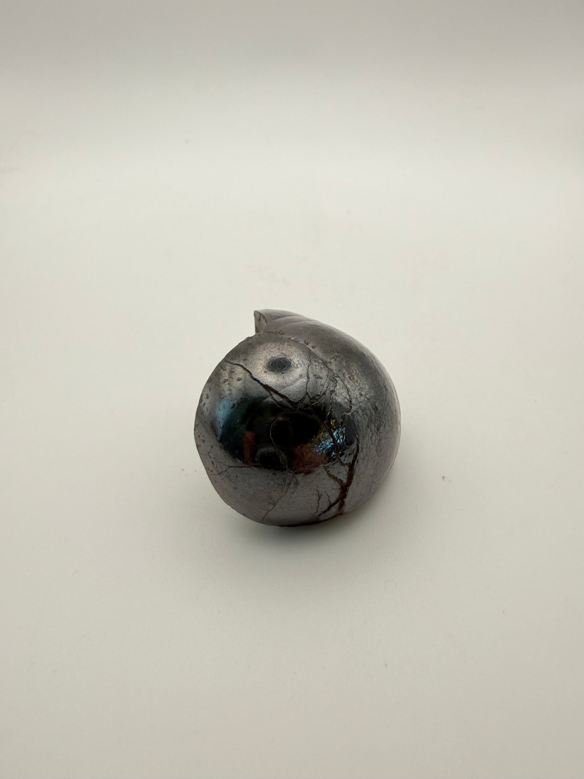Small raw hematite specimen.