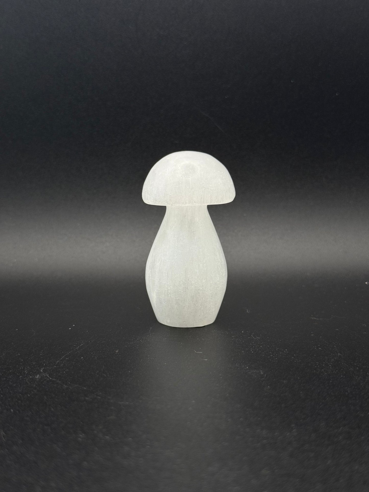 Selenite in the shape of a mushroom.
