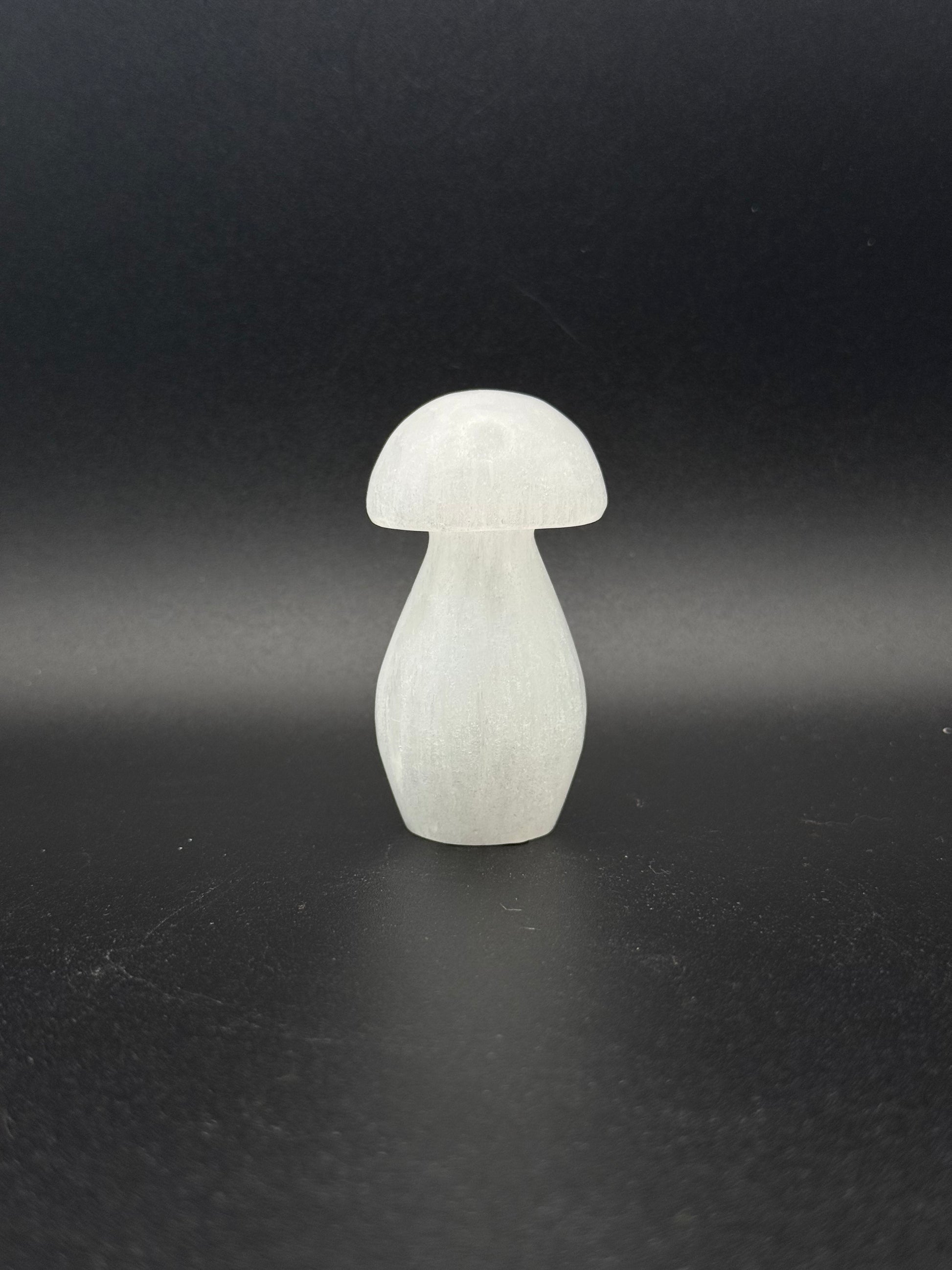 Selenite in the shape of a mushroom.