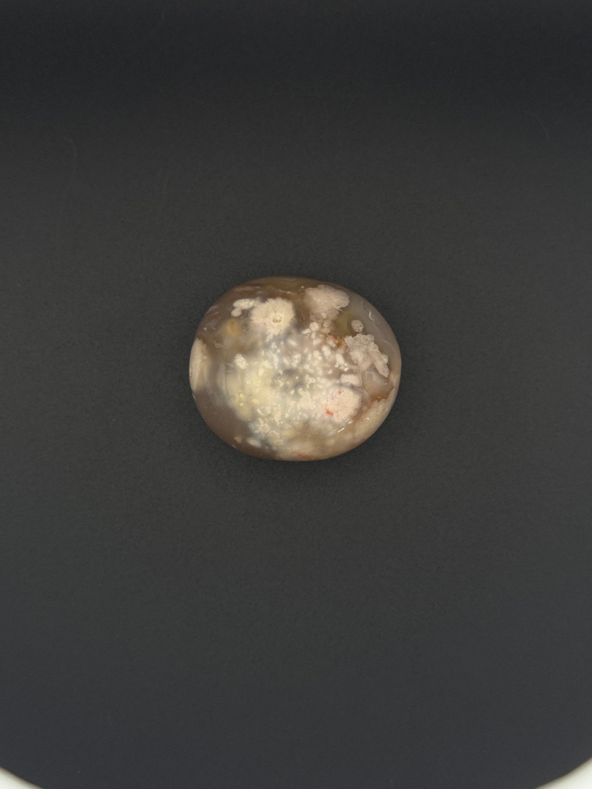 Flower agate polished crystal palm stone.