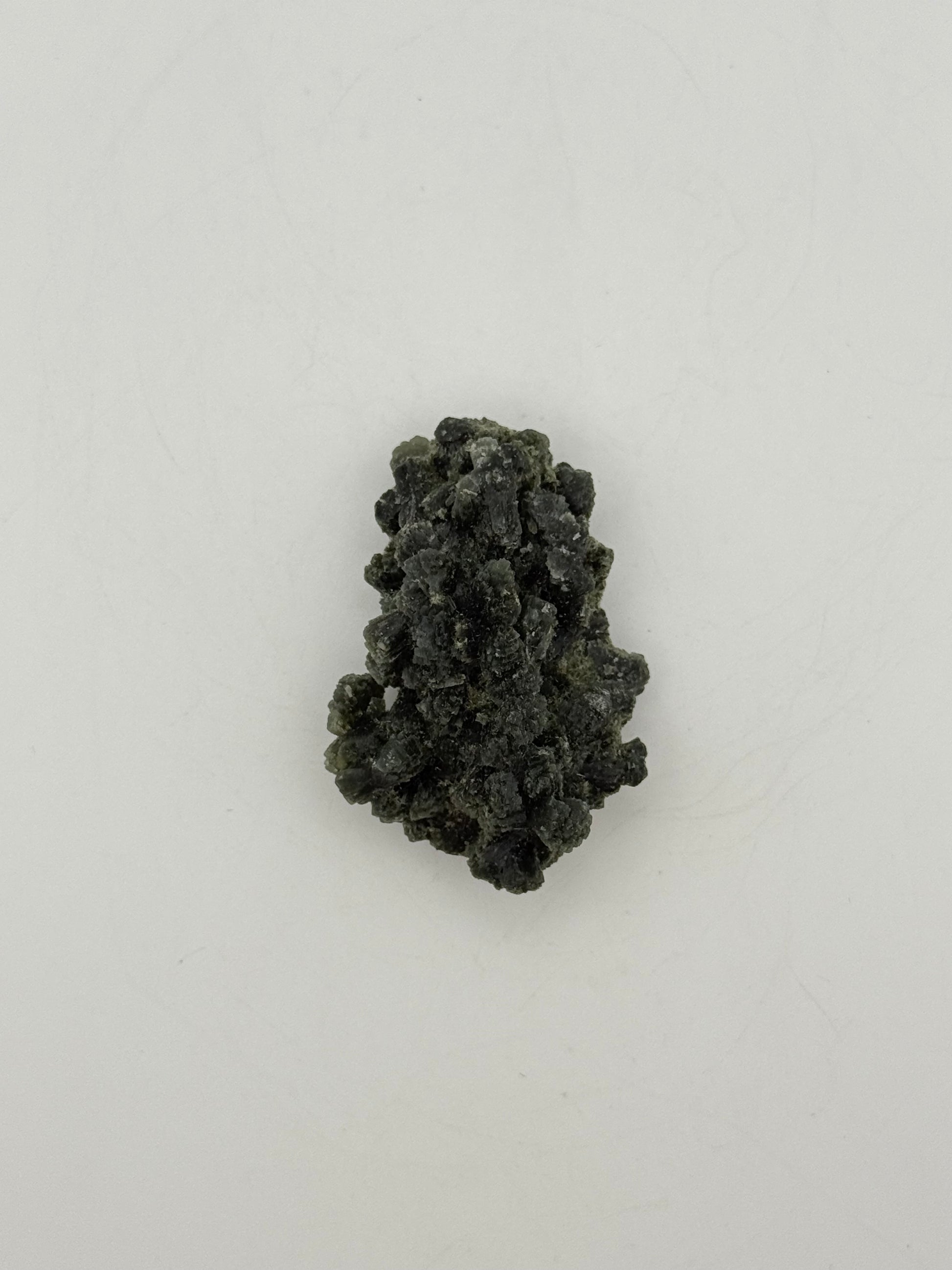 Raw prehnite specimen with amazing green color.