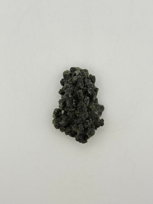 Raw prehnite specimen with amazing green color.