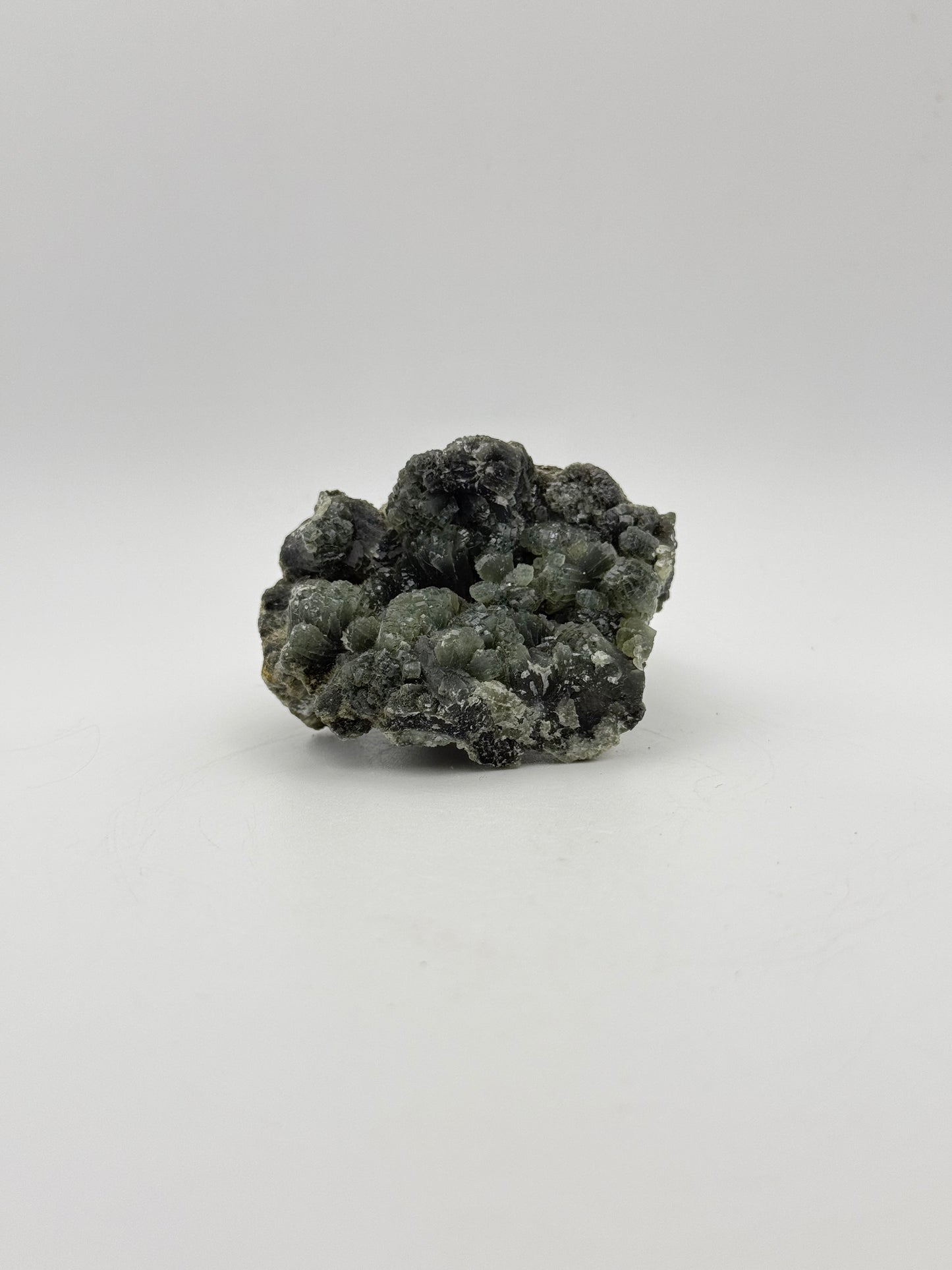 Raw prehnite specimen with amazing green color.