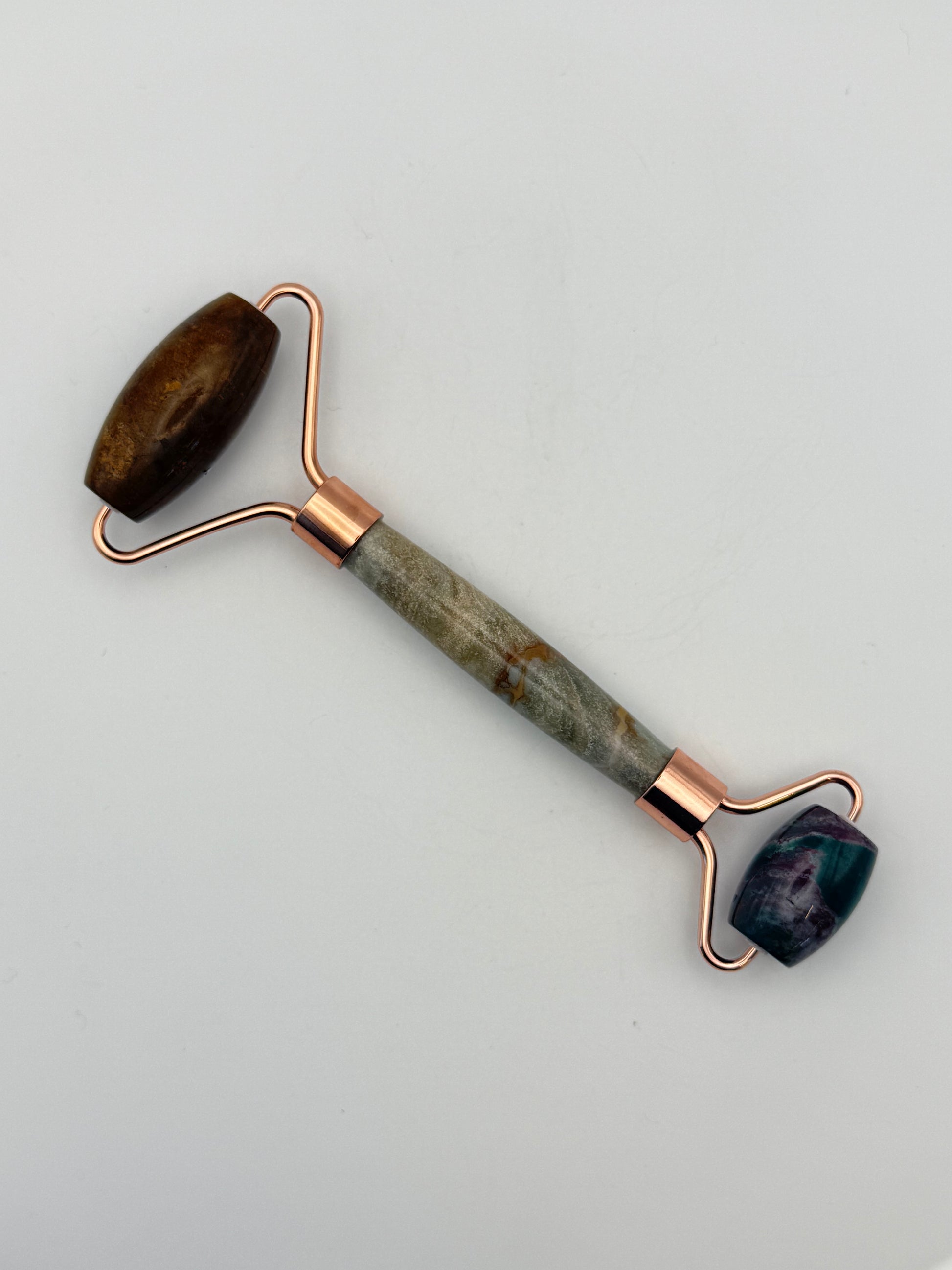 Massage roller made from ocean jasper stone.