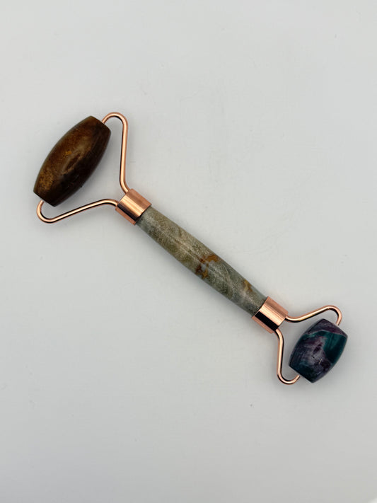 Massage roller made from ocean jasper stone.