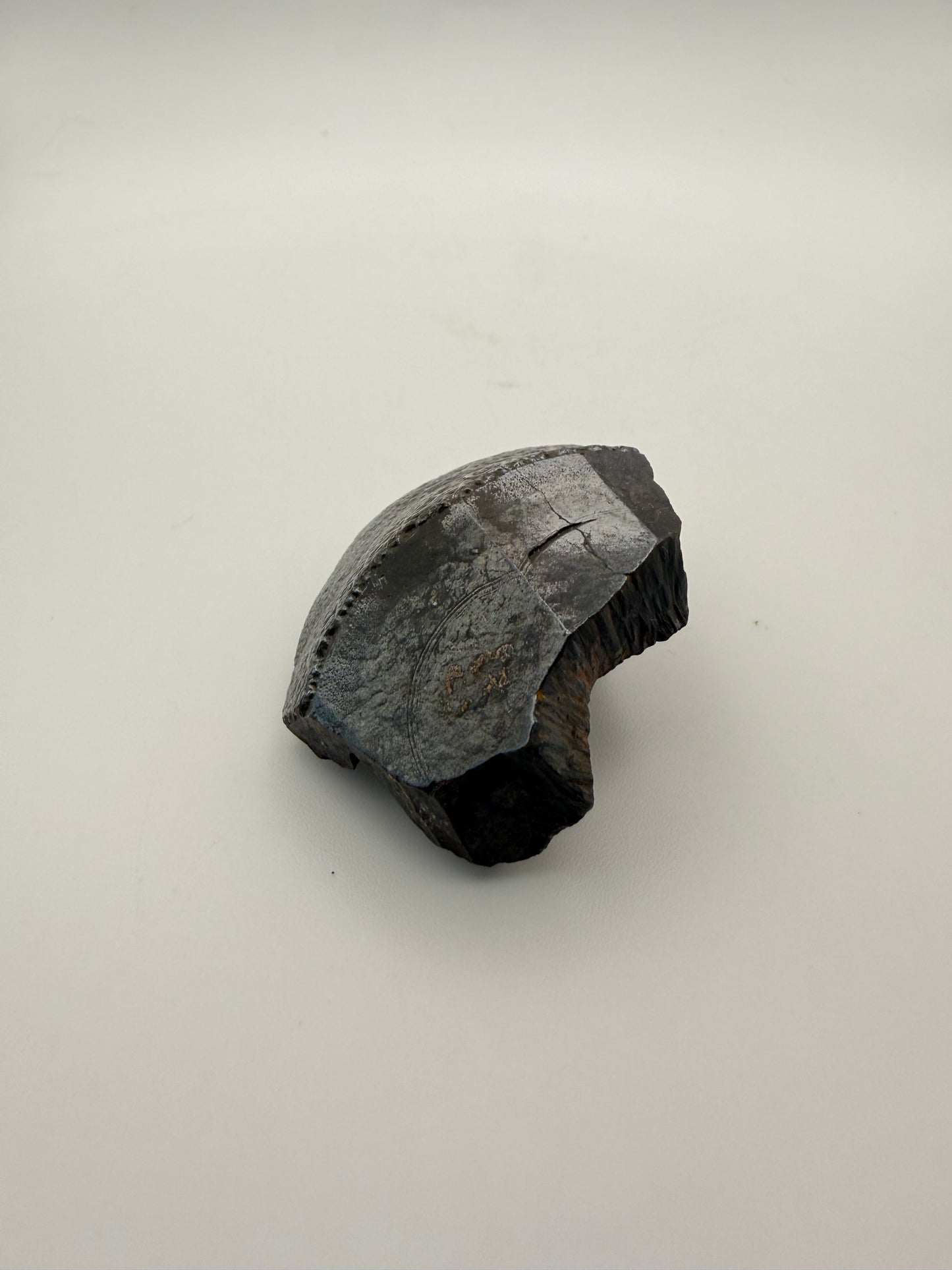 Small raw hematite specimen.