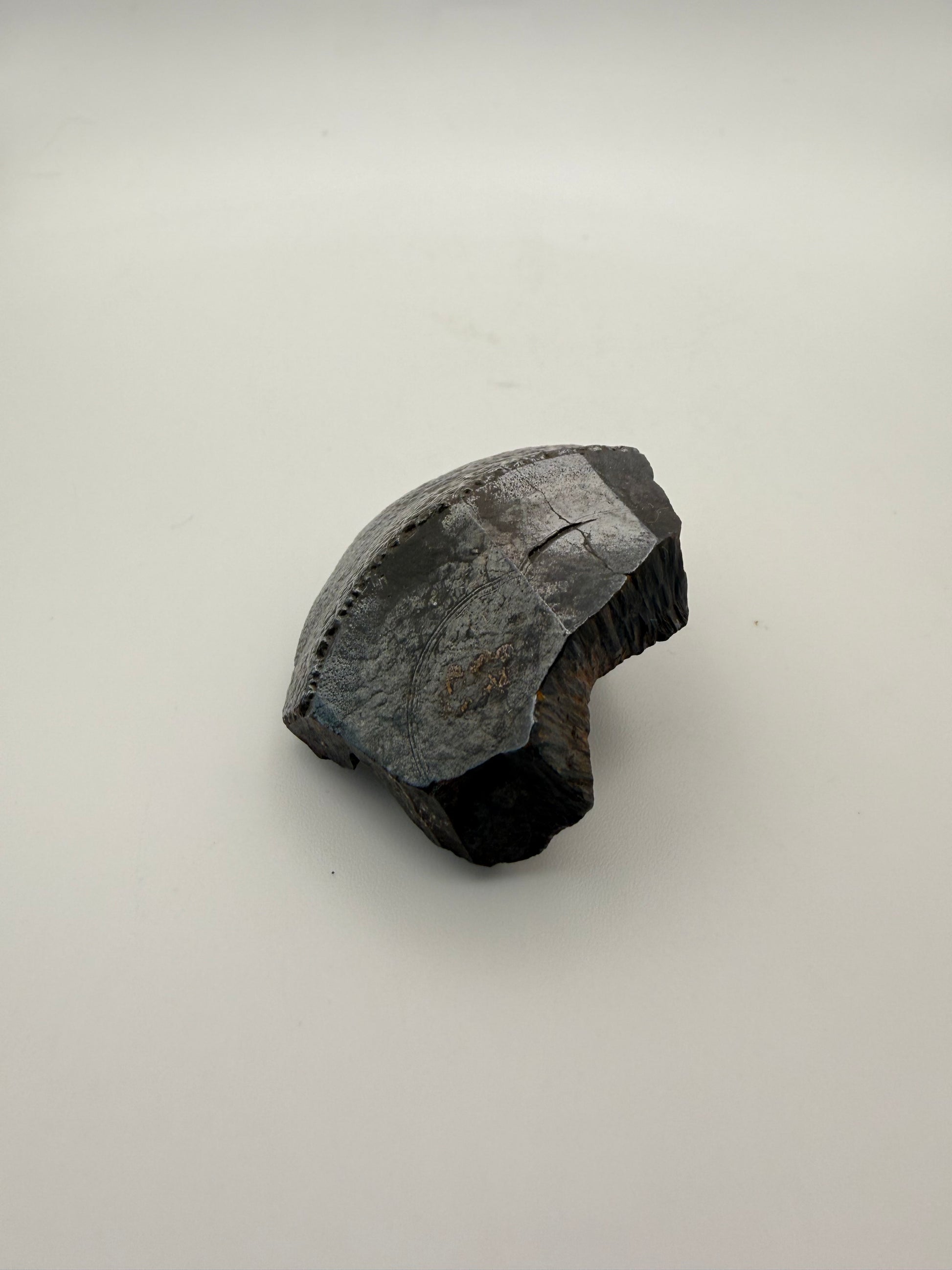 Small raw hematite specimen.