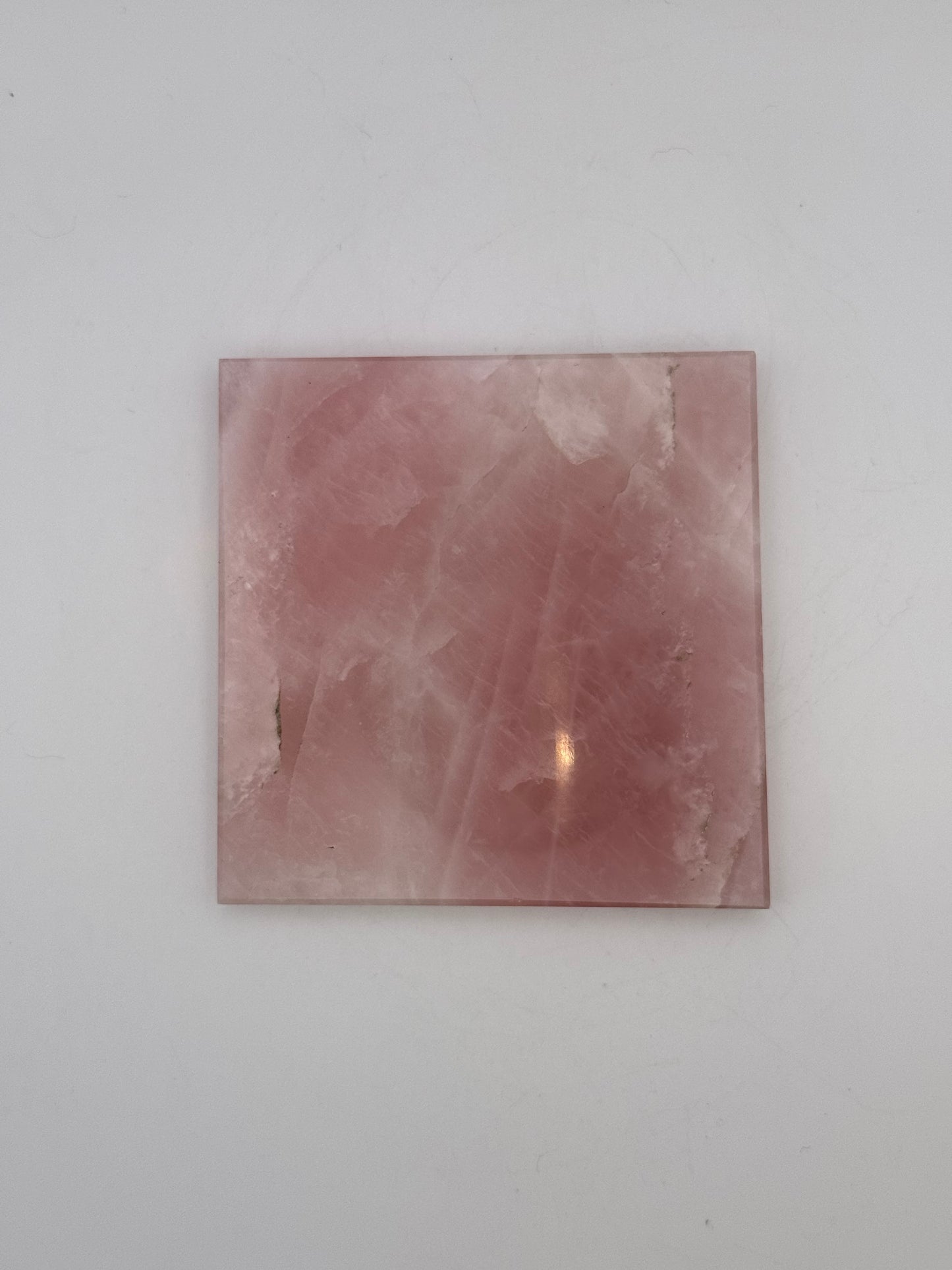 Polished rose quartz tile.