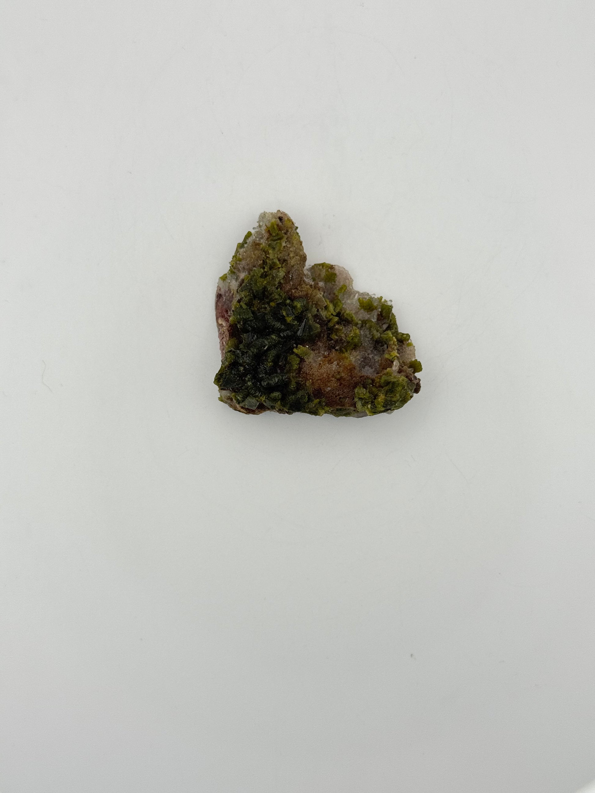 Epidote crystal cluster with good green color.