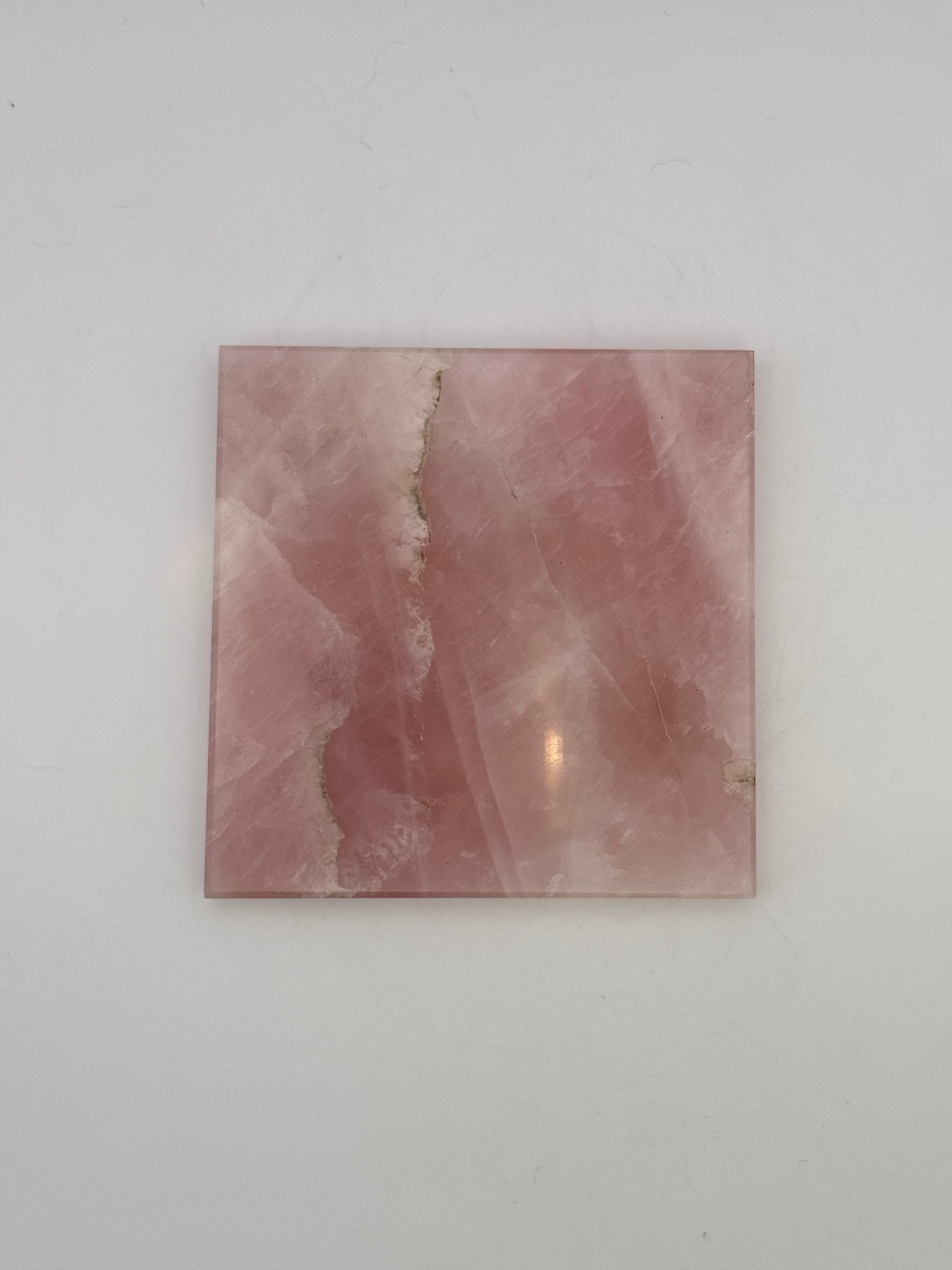 Polished rose quartz tile.