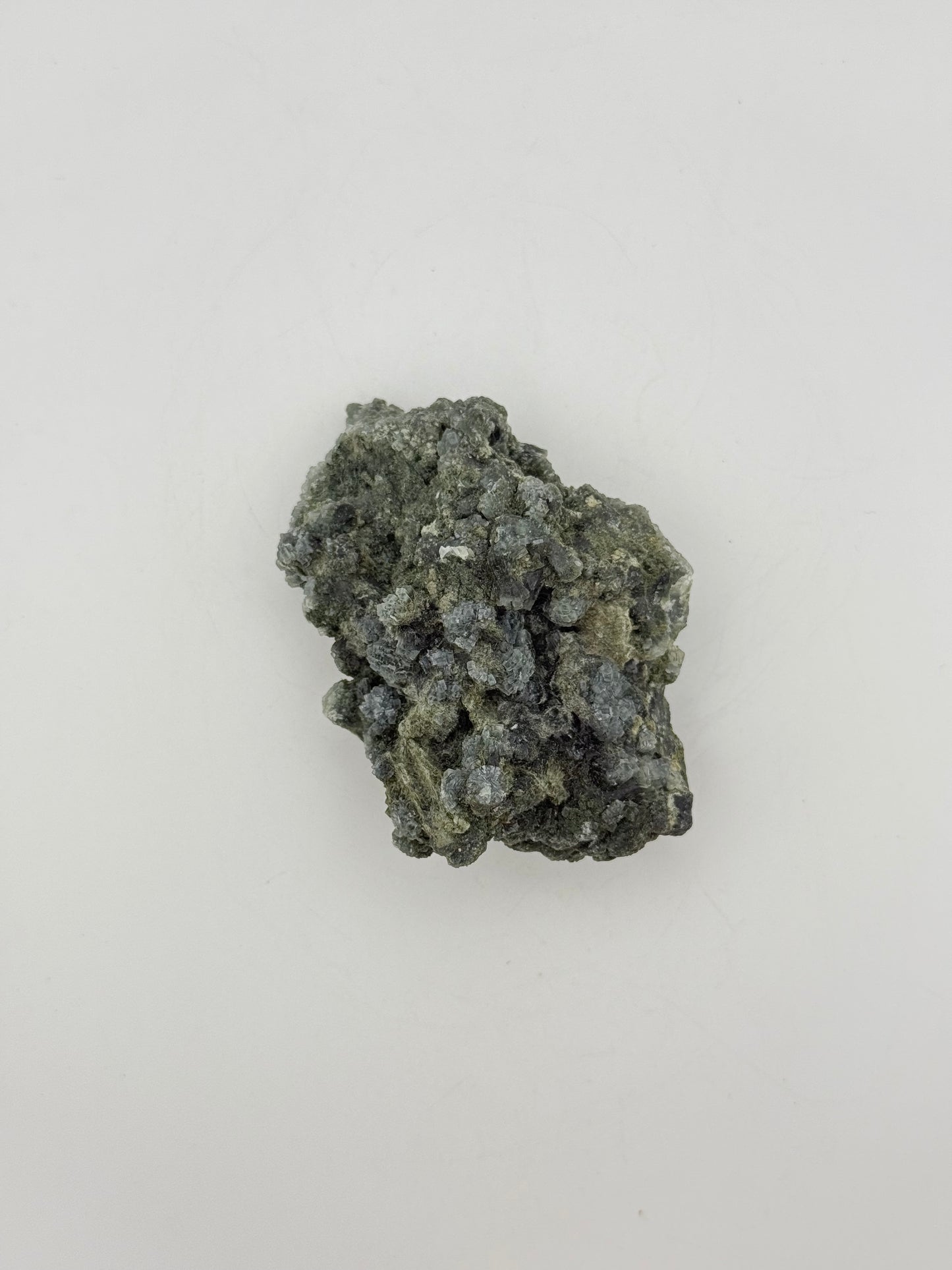 Raw prehnite specimen with amazing green color.