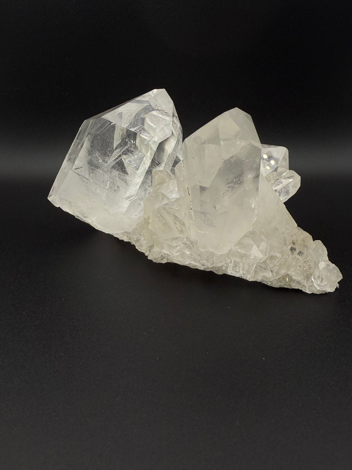 Large cluster of clear quartz crystals.