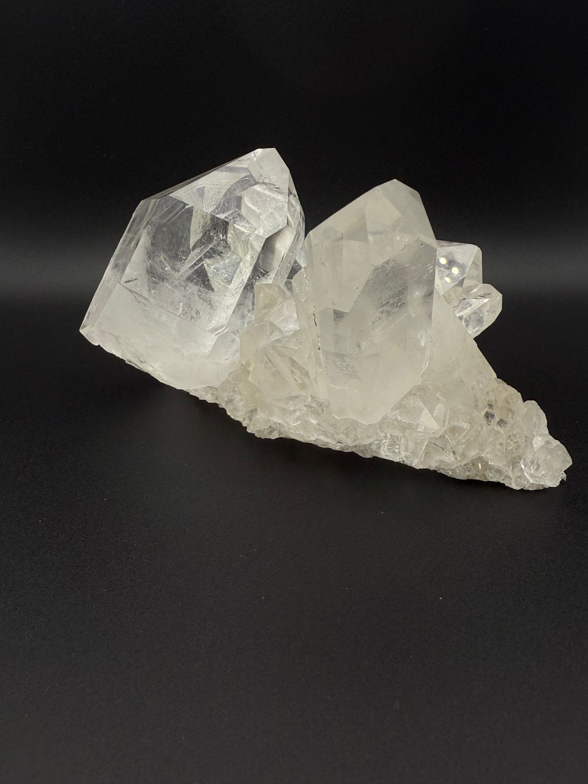 Large cluster of clear quartz crystals.