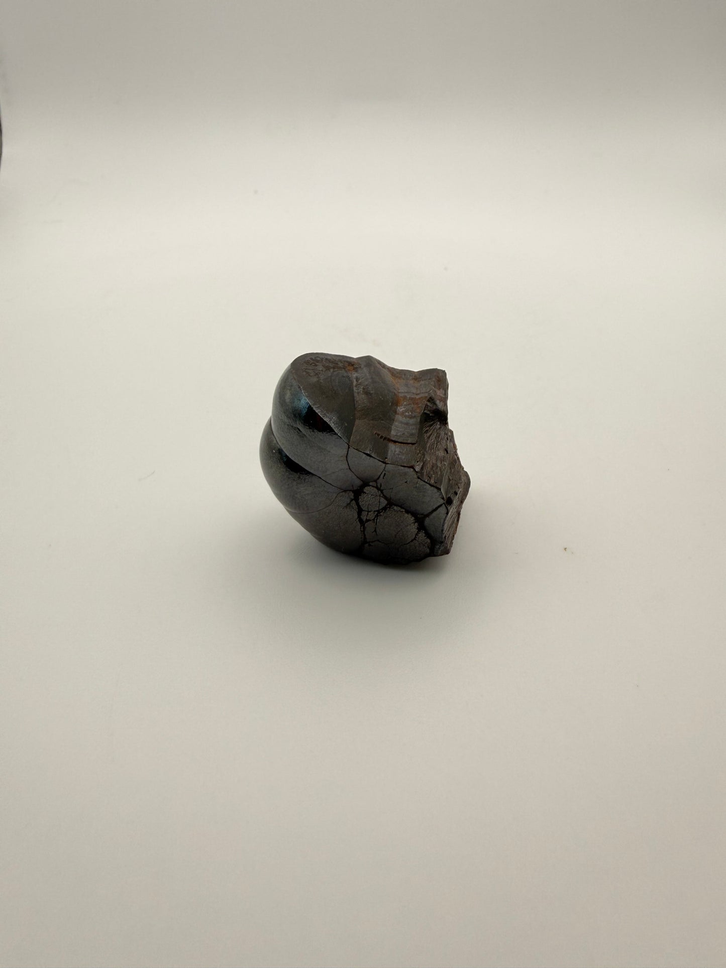 Small raw hematite specimen.