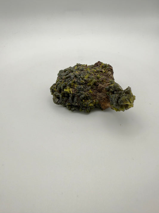 Epidote crystal cluster with good green color.