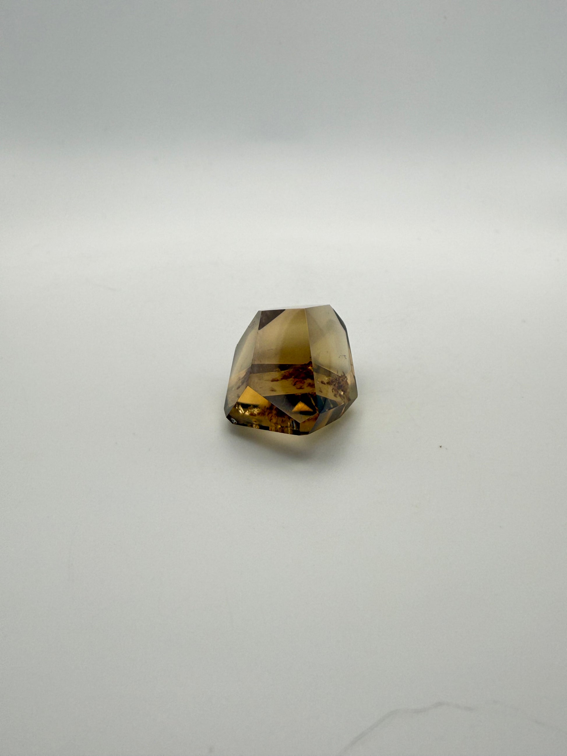 Polished natural citrine point.