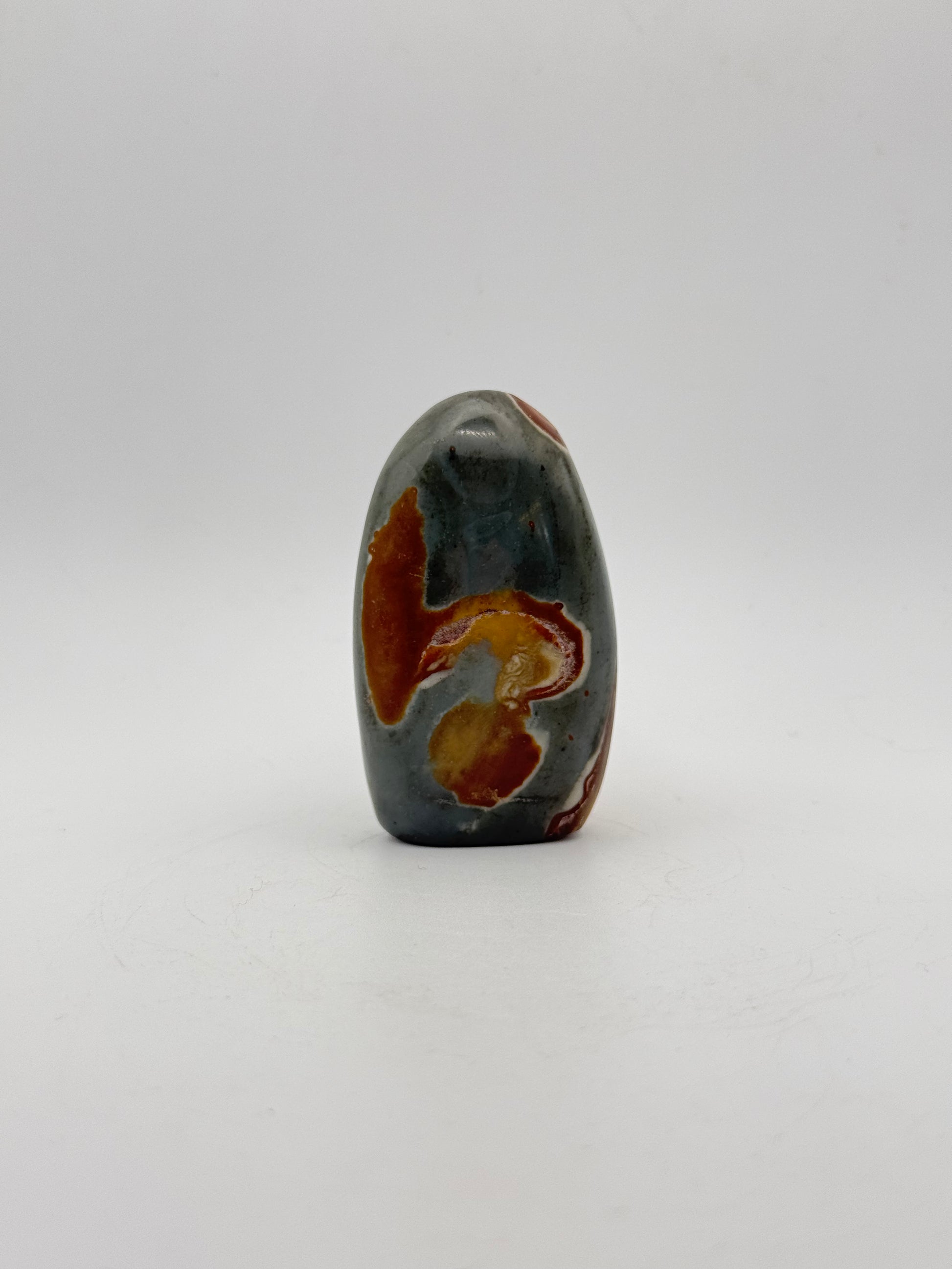 A polished polychrome jasper free from.
