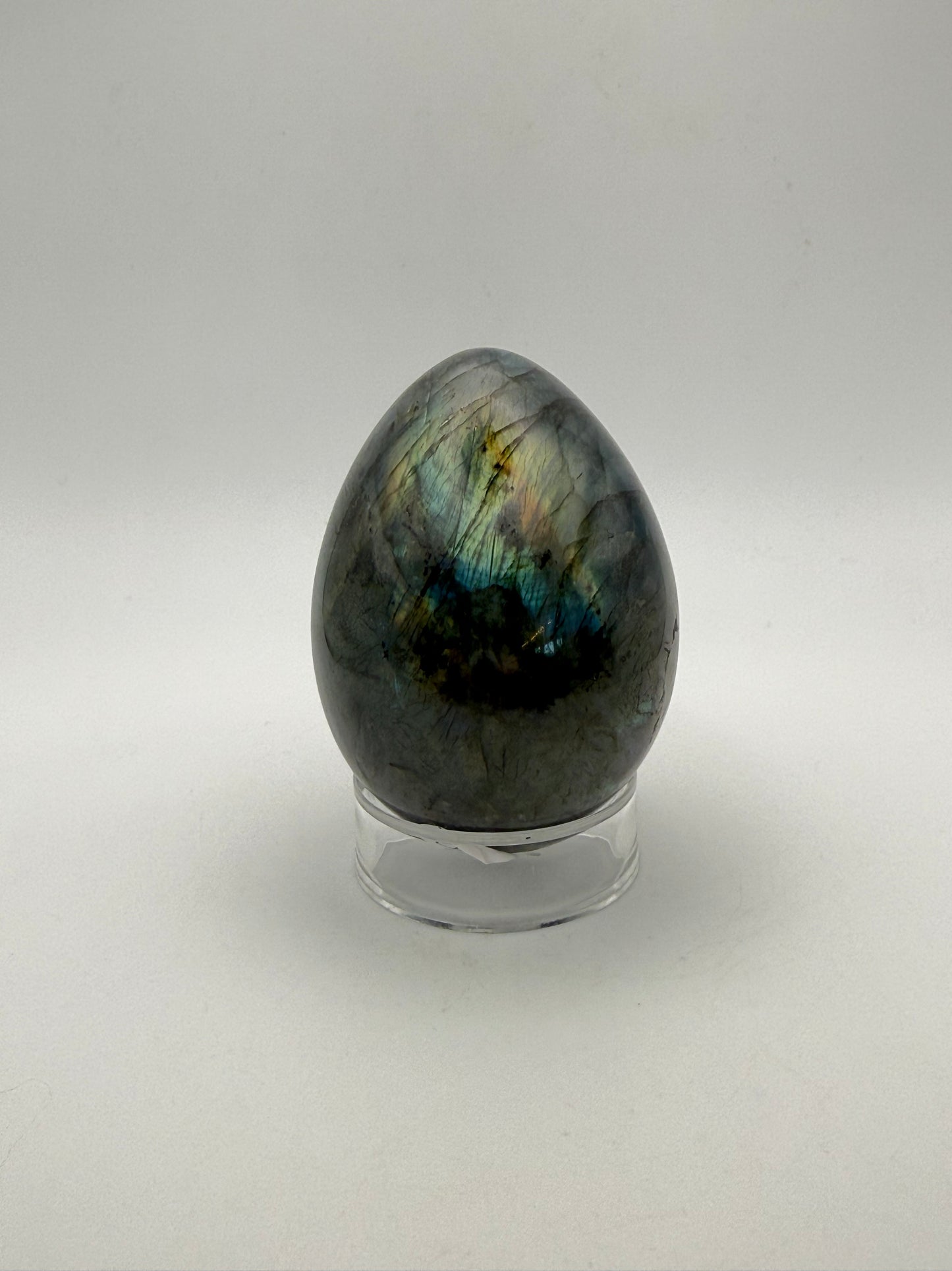 Labradorite polished stone in the shape of an egg.