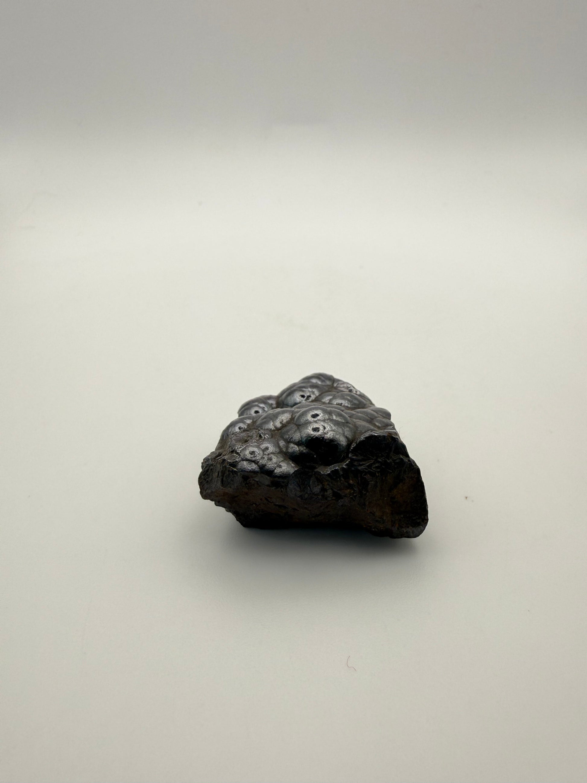 Small raw hematite specimen.
