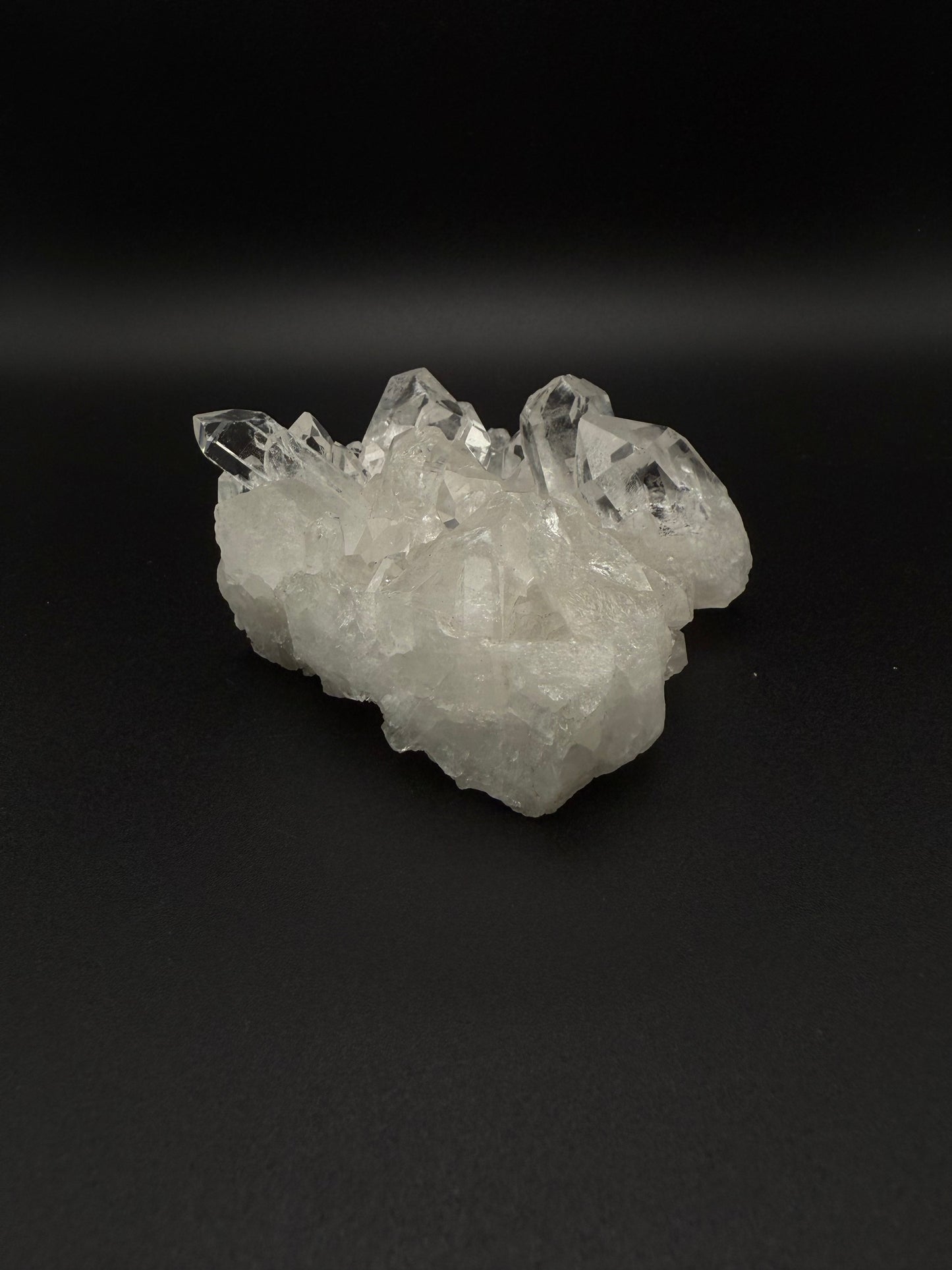 Clear Quartz crystal cluster specimen.