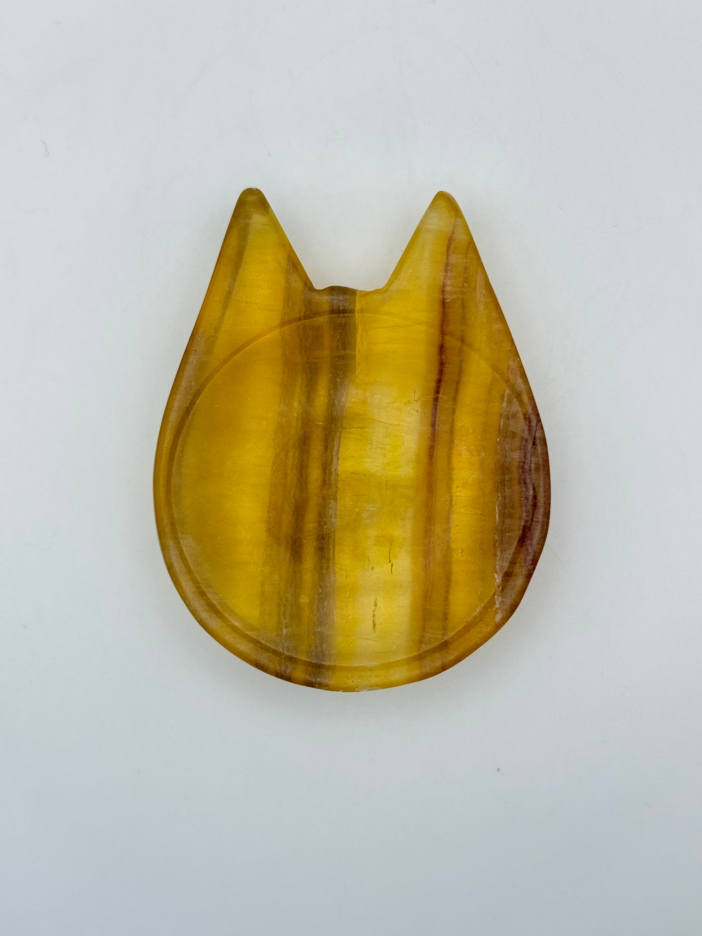 Polished Fluorite crystal in the shape of a cat bowl.