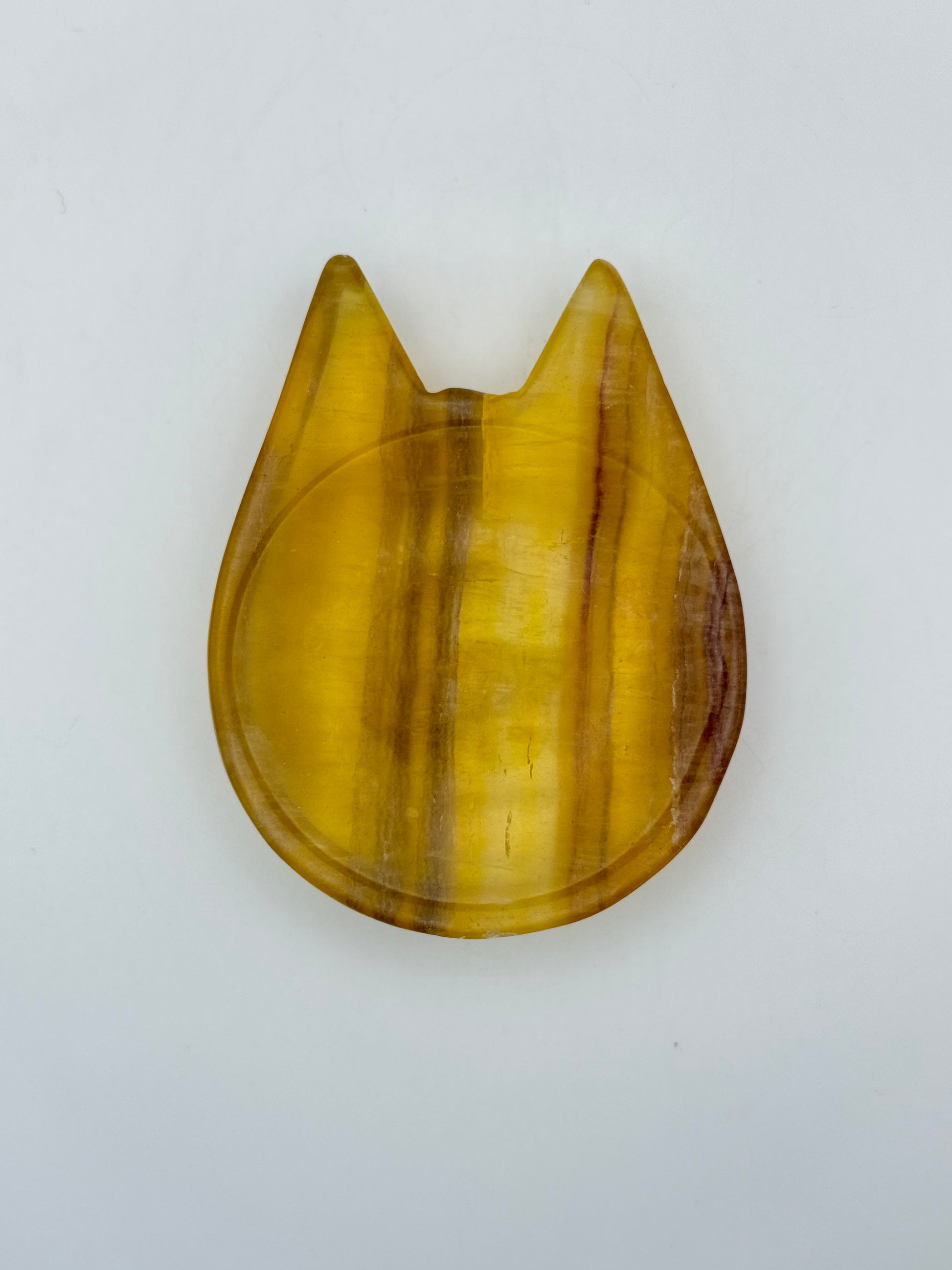 Polished Fluorite crystal in the shape of a cat bowl.