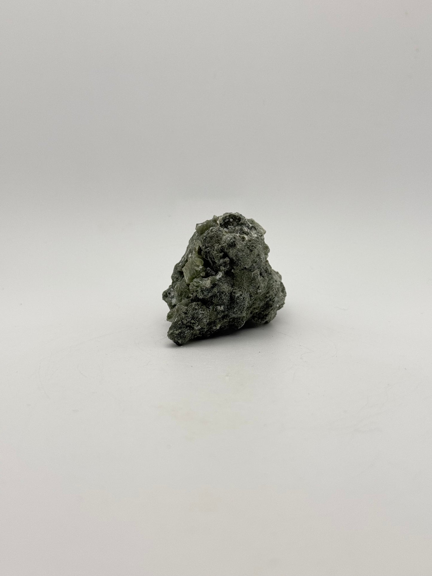 Raw prehnite specimen with amazing green color.