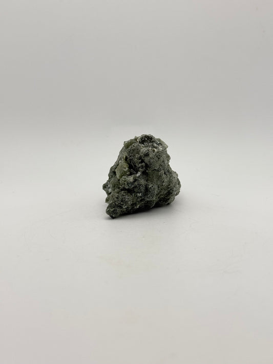 Raw prehnite specimen with amazing green color.