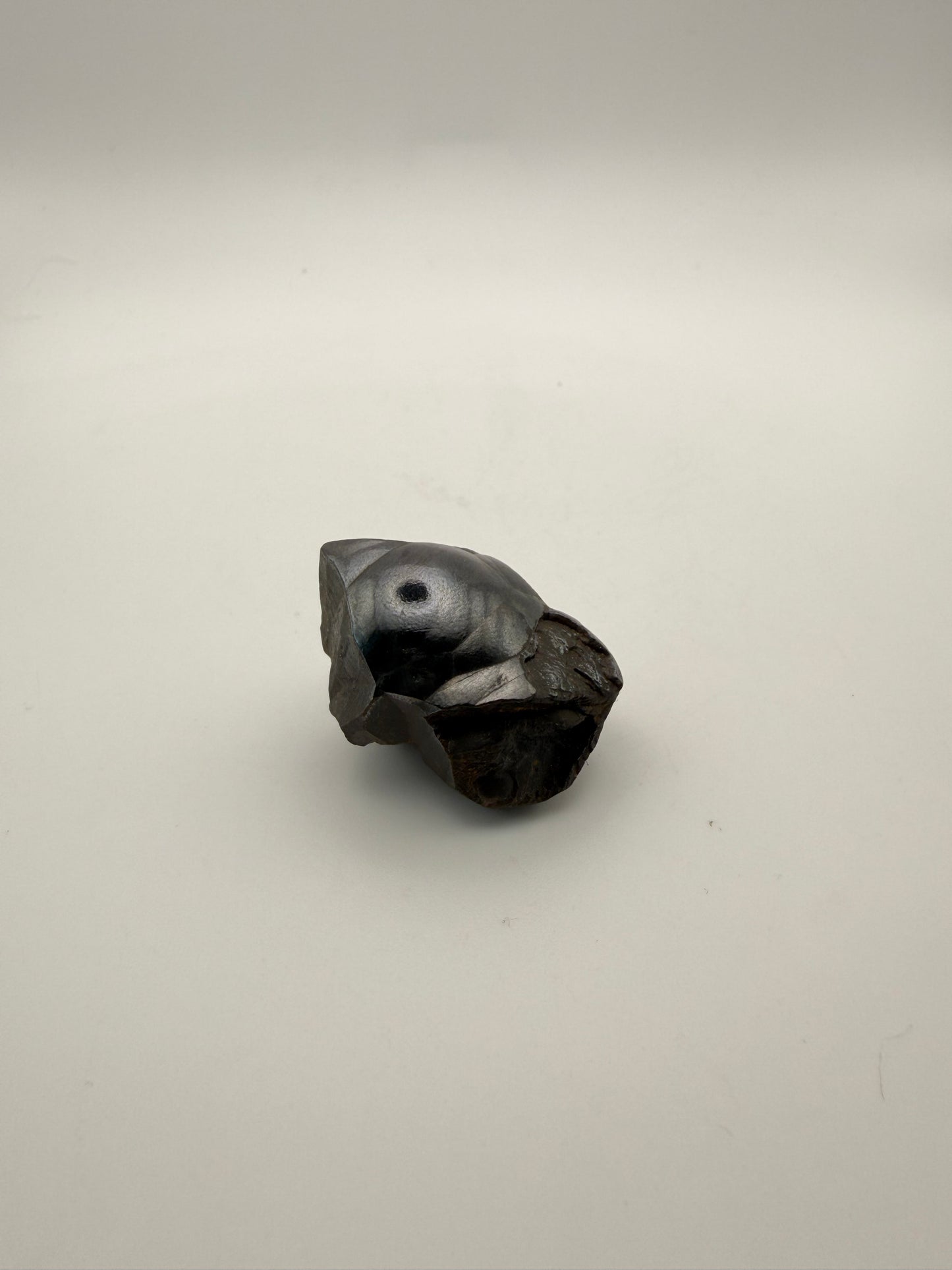Small raw hematite specimen.
