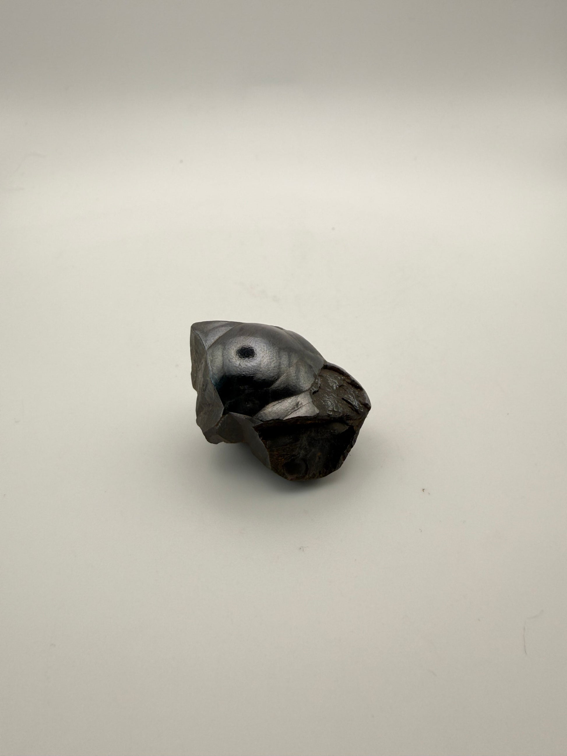 Small raw hematite specimen.