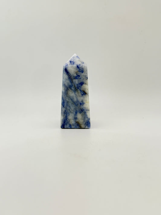 Afghanite four sided tower. Height of 3 inches, width of 1 1/8 inches.