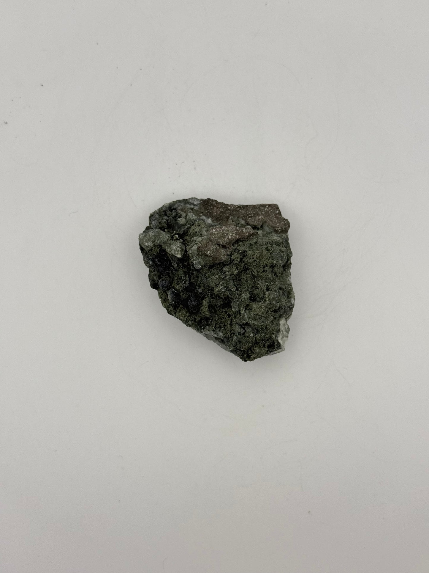 Raw prehnite specimen with amazing green color.