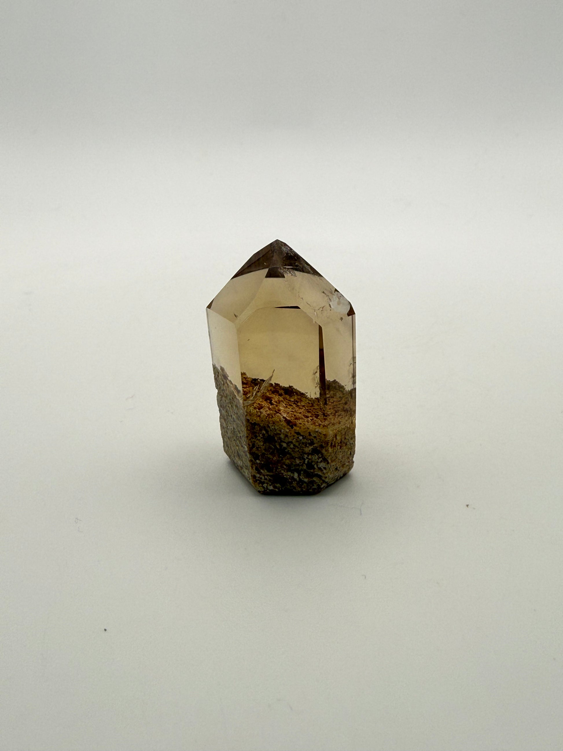 Polished natural citrine point.