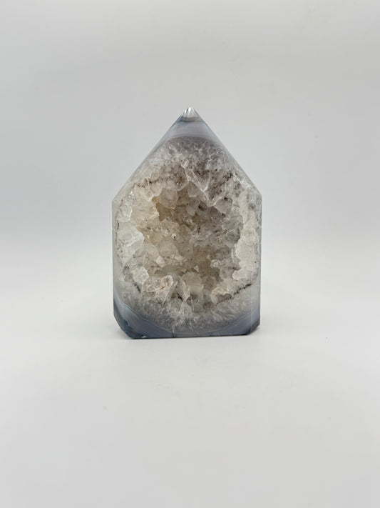 Polished druzy agate tower. a little over 4 inches tall.
