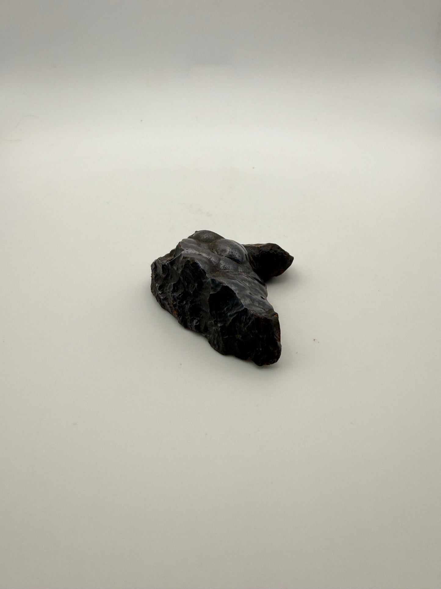 Small raw hematite specimen.
