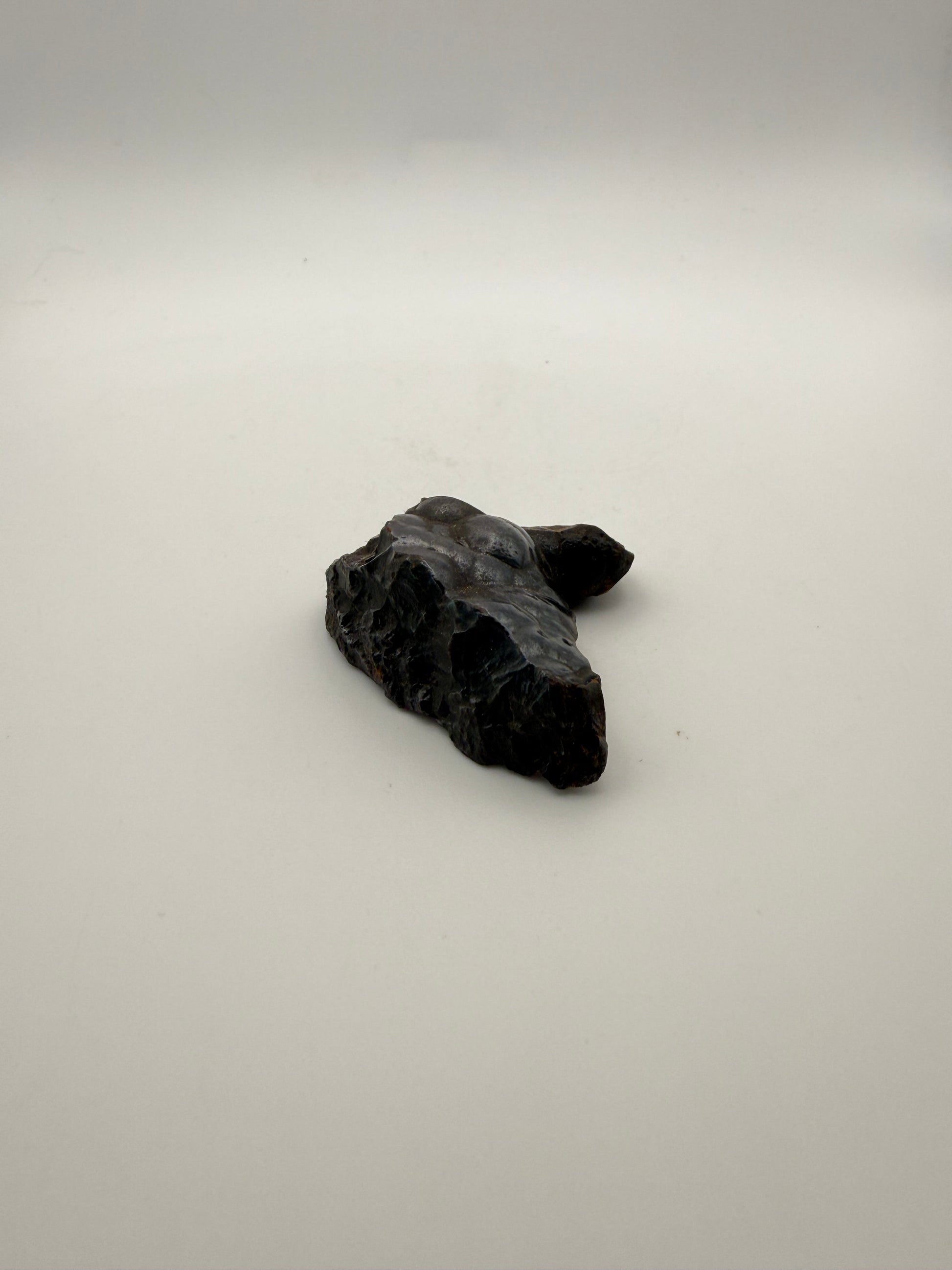 Small raw hematite specimen.