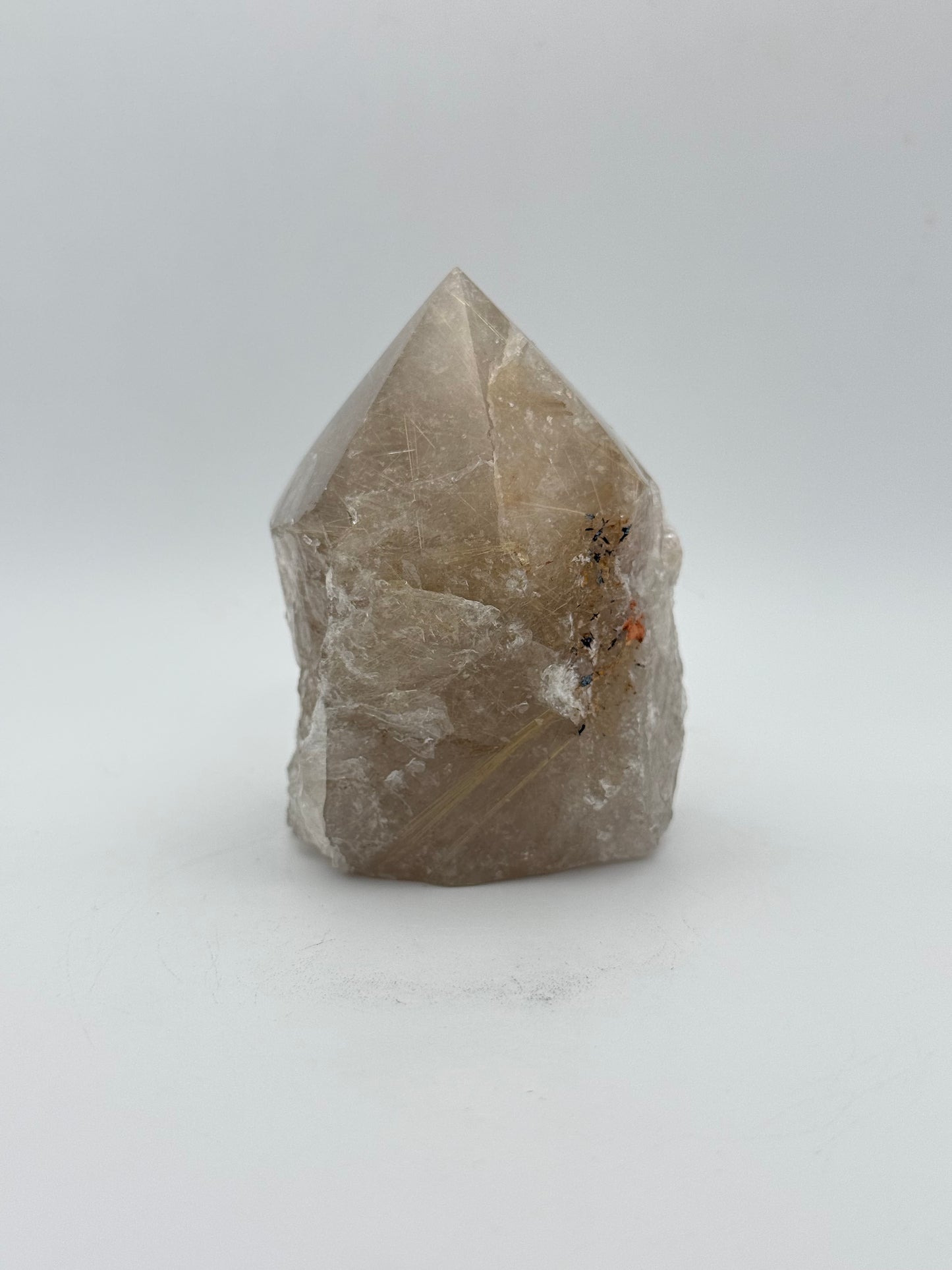 Smoky quartz tower with the top side polished and bottom natural.