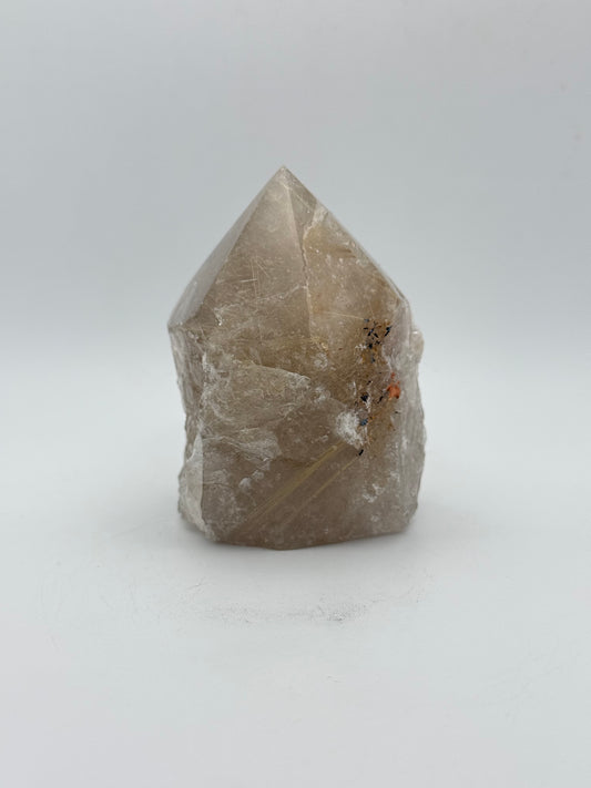 Smoky quartz tower with the top side polished and bottom natural.