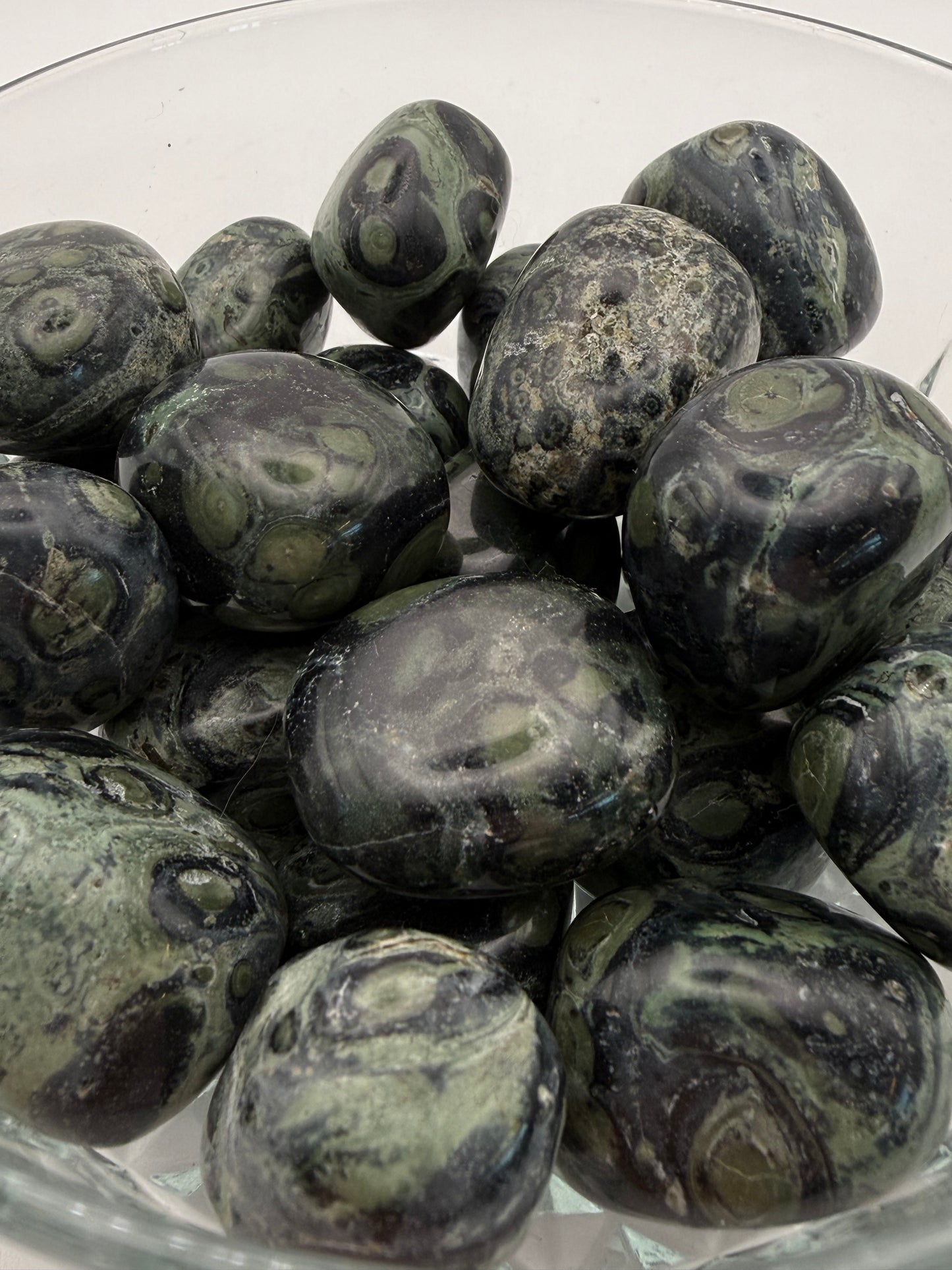 Close-up of polished kambaba jasper tumbles.